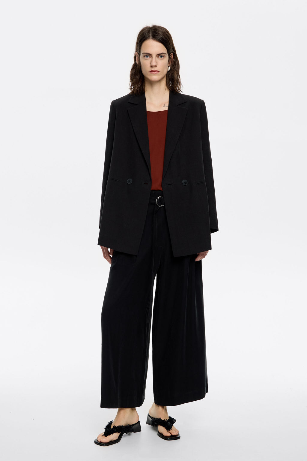 Black flared ankle-length trousers