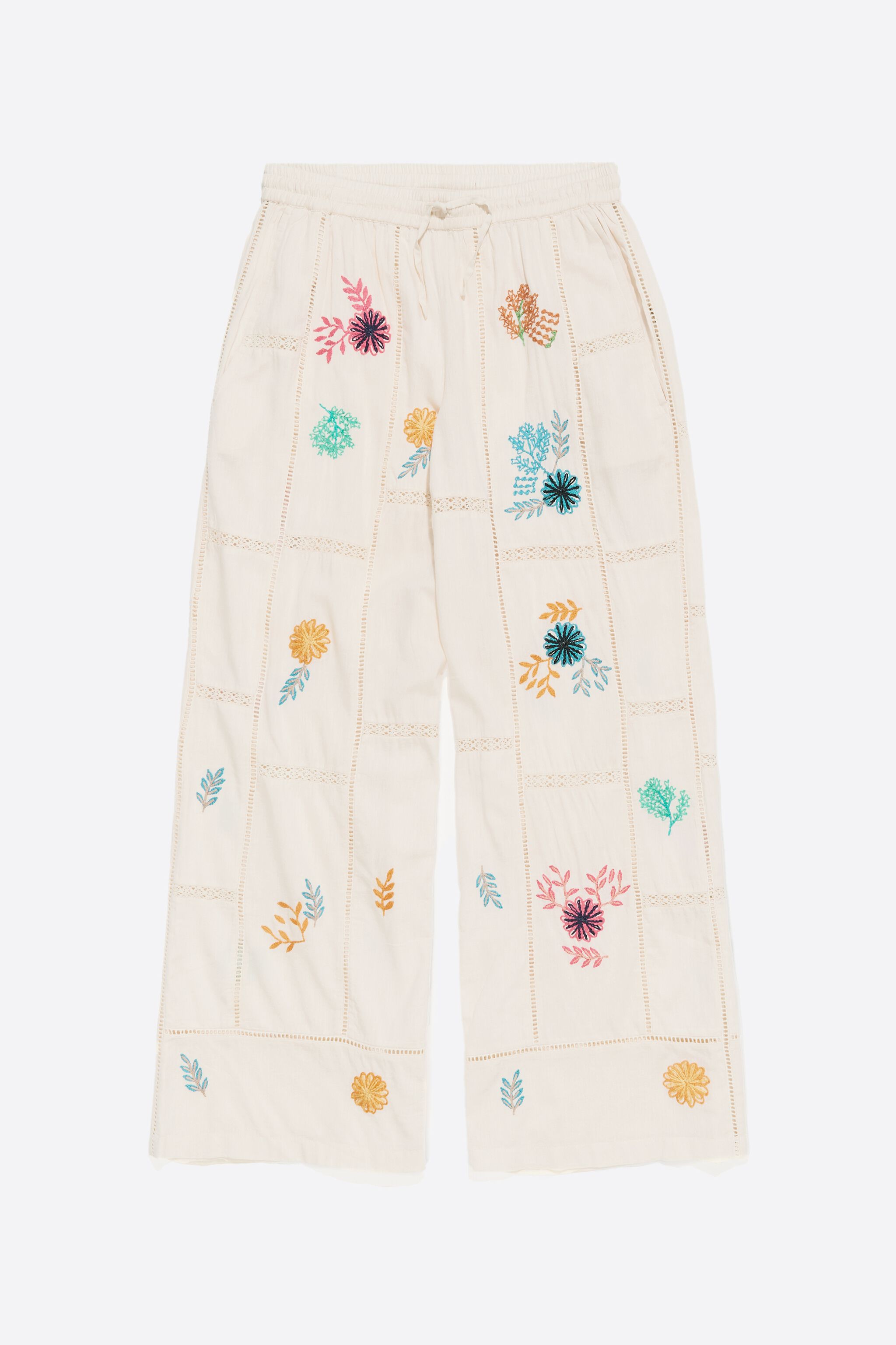 Cream jogger trousers with multicolor embroidery