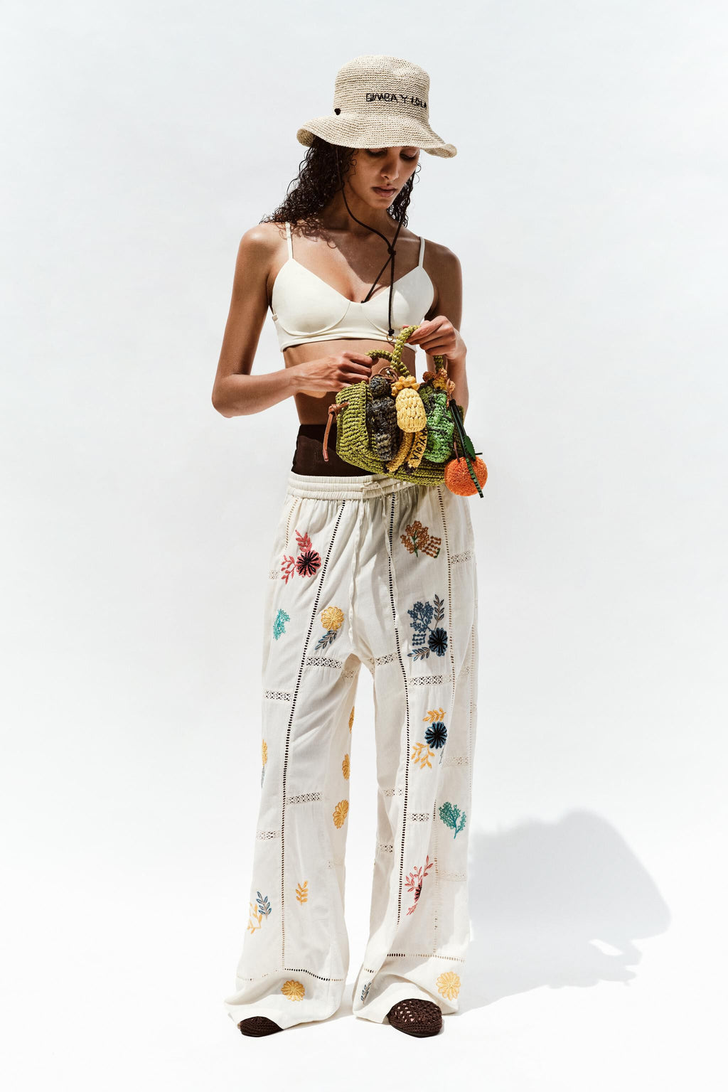 Cream jogger trousers with multicolor embroidery