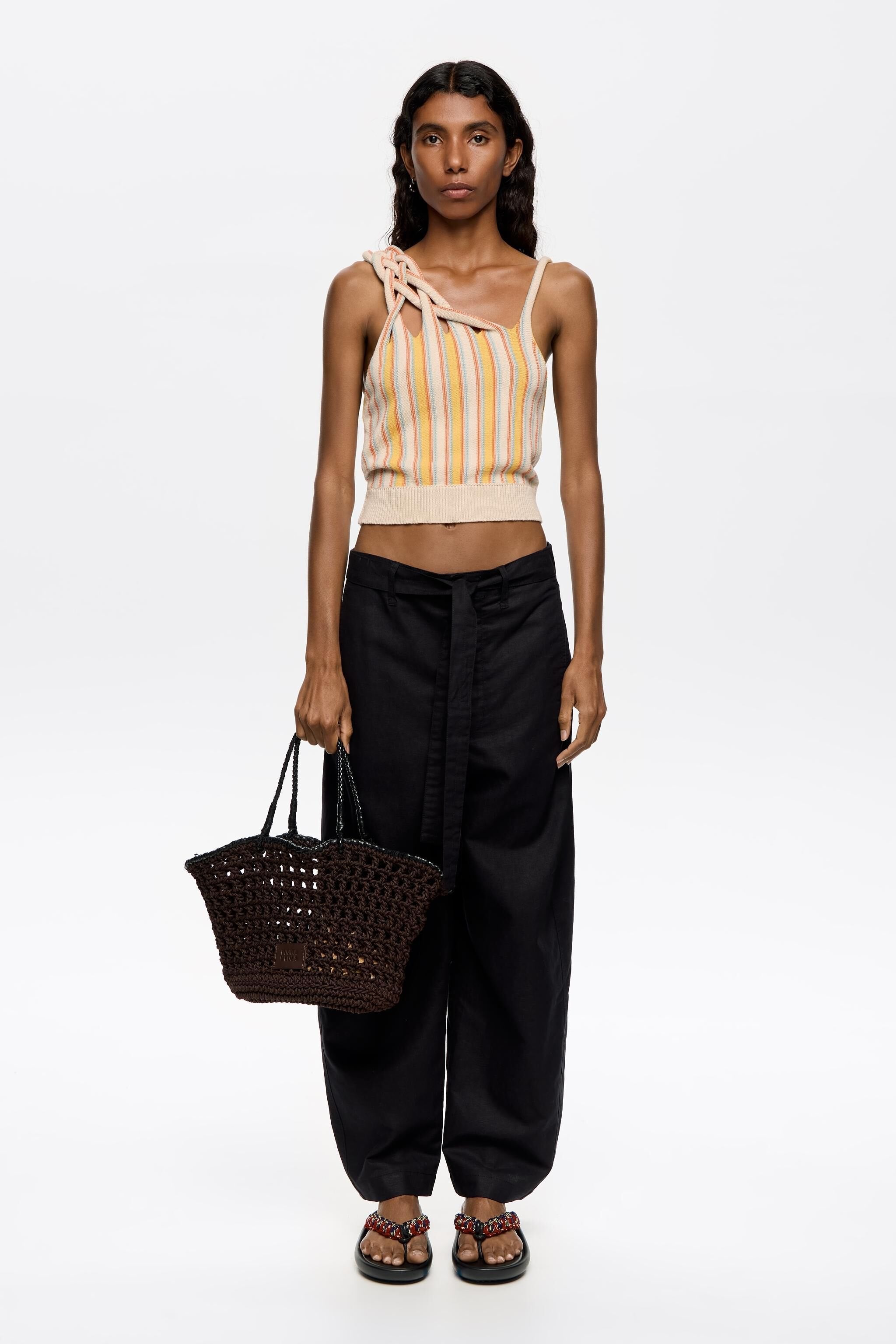 Black linen barrel leg trousers