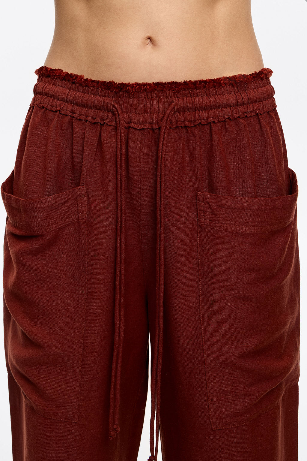 Brown linen jogger trousers with maxi pockets