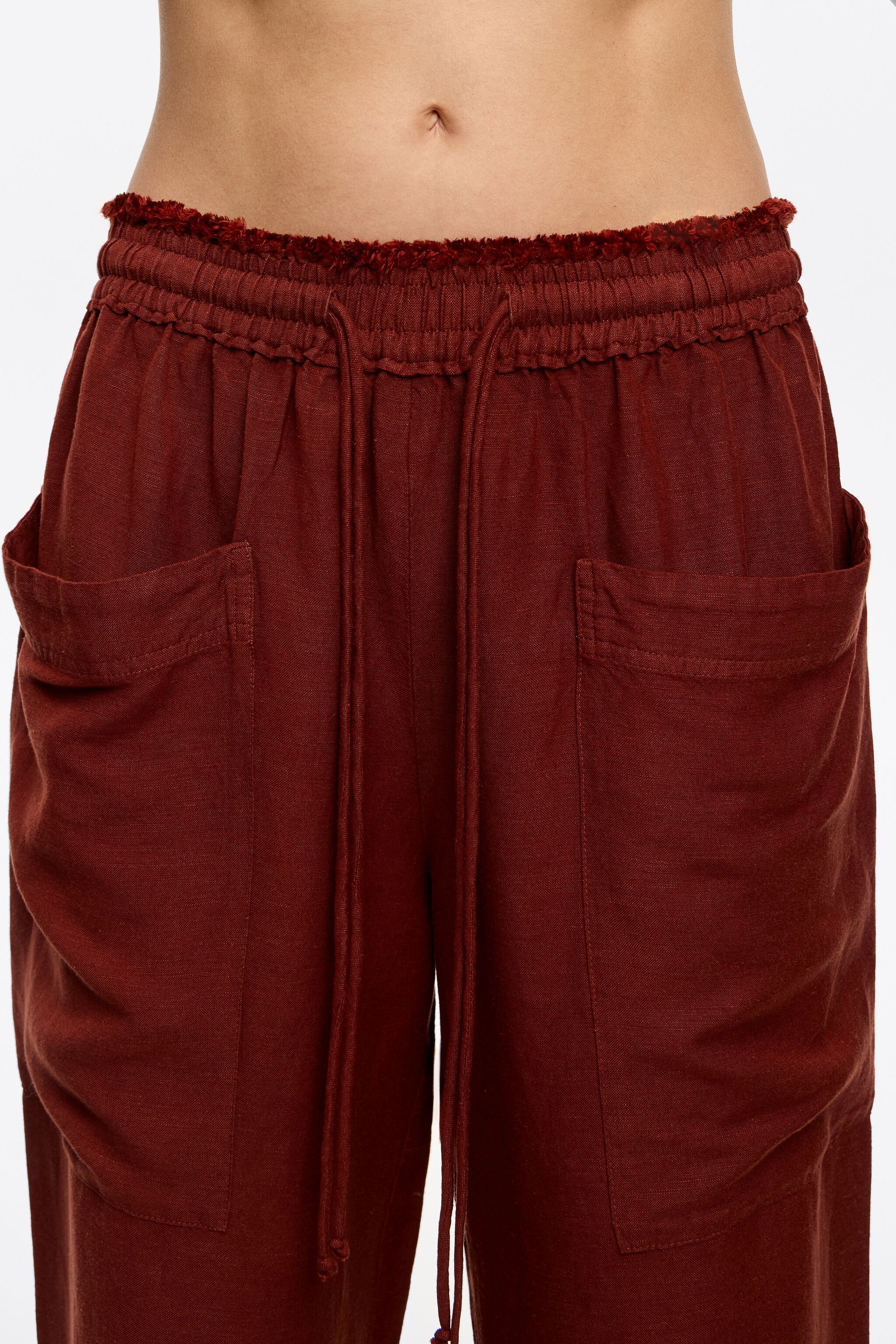 Brown linen jogger trousers with maxi pockets