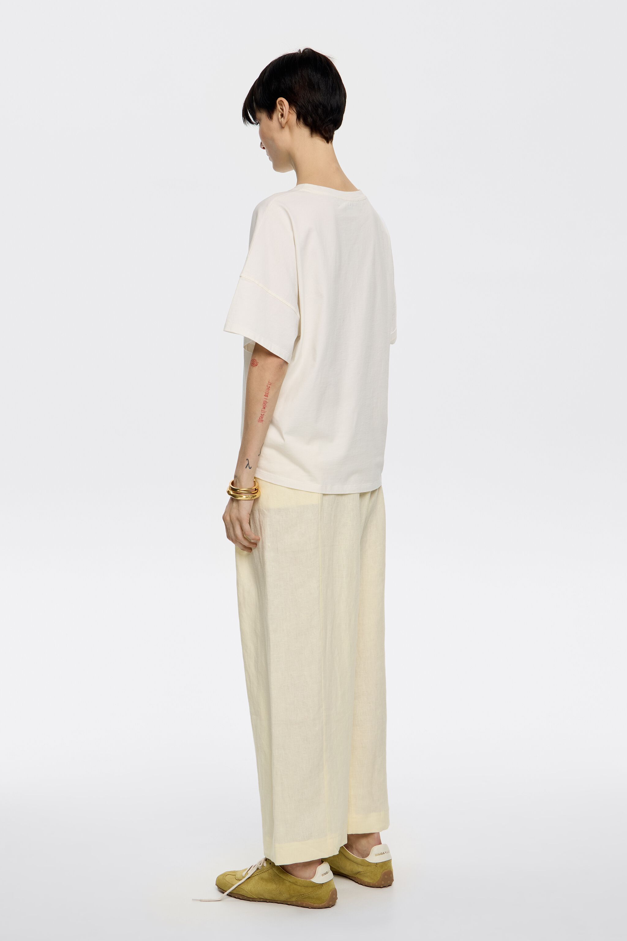 Light yellow linen darted trousers