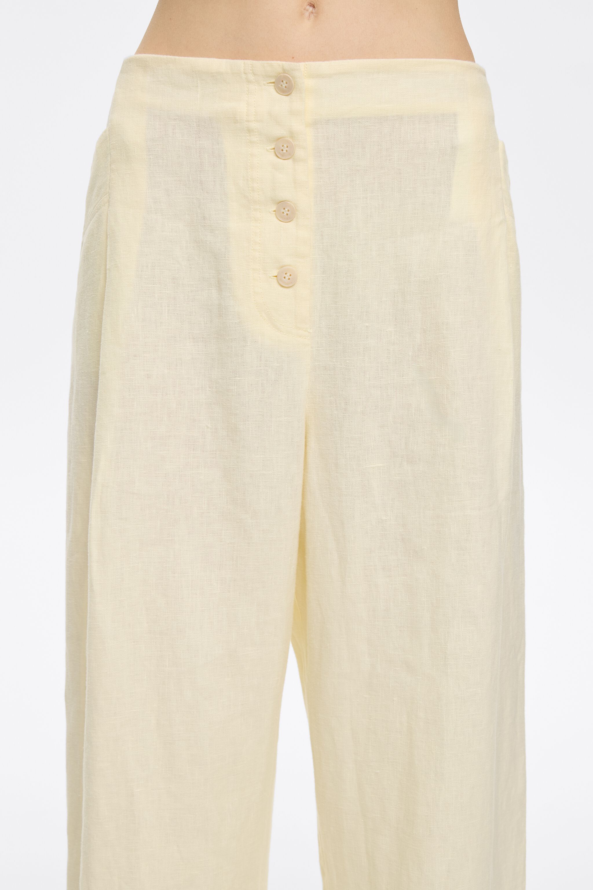 Light yellow linen darted trousers