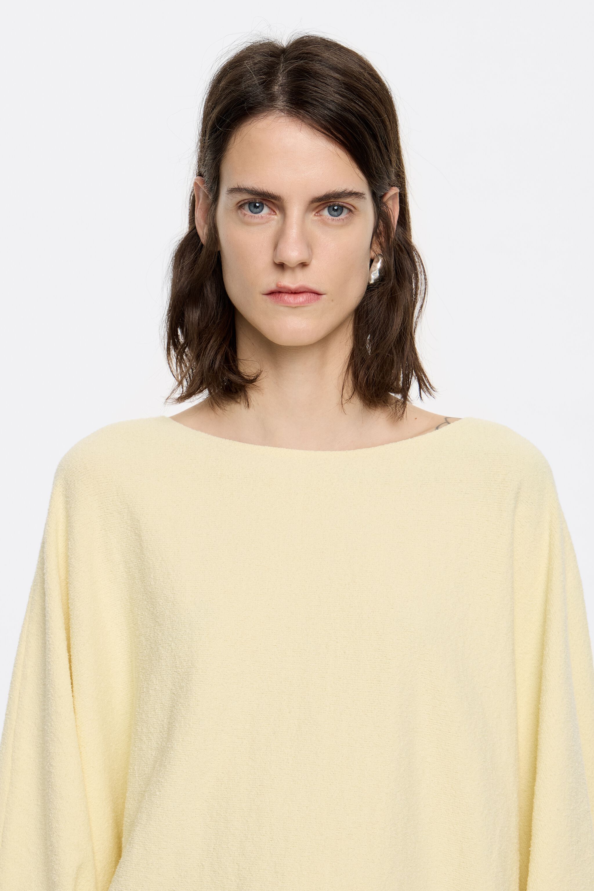 Light yellow batwing sweater