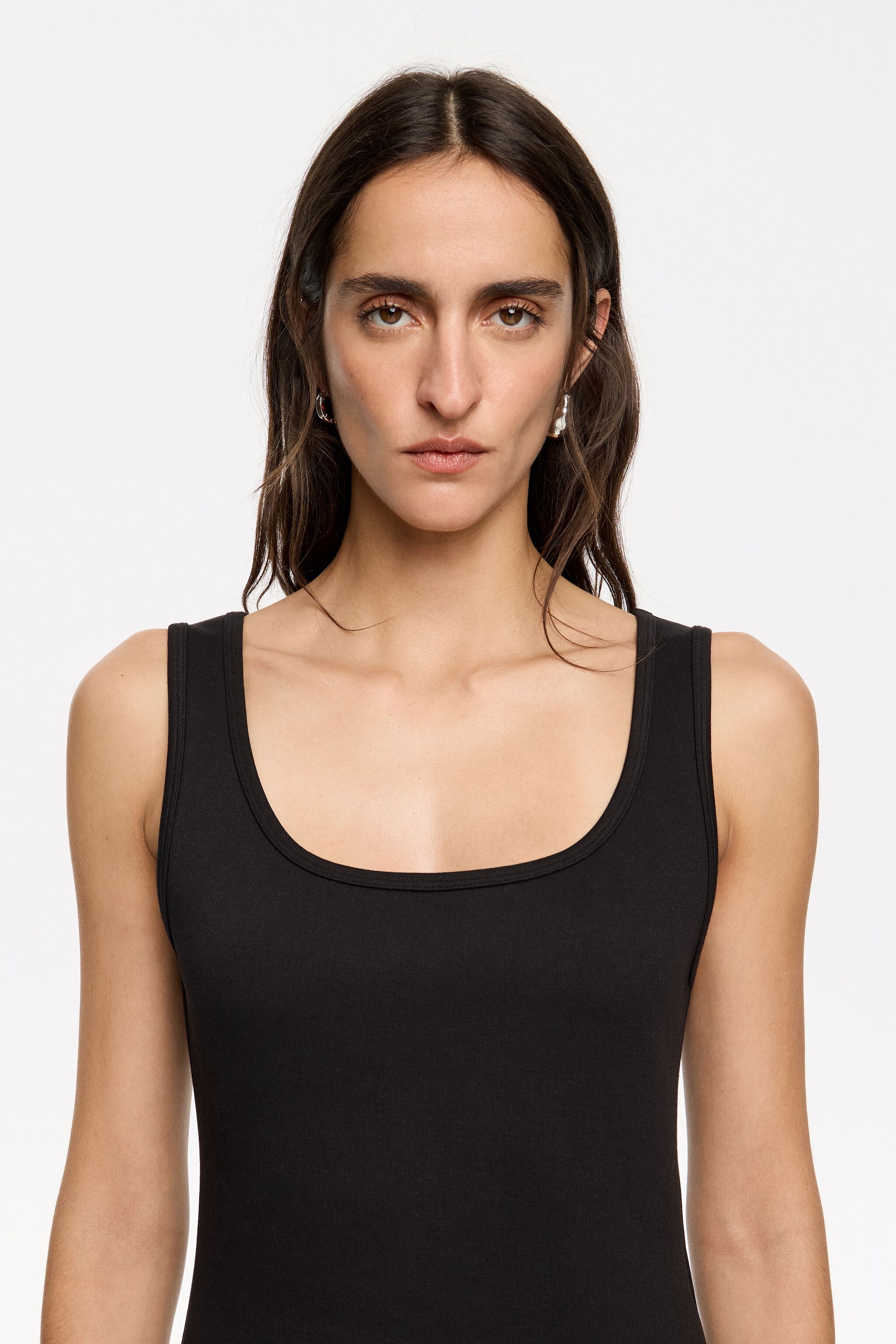 Black fitted top with square neckline