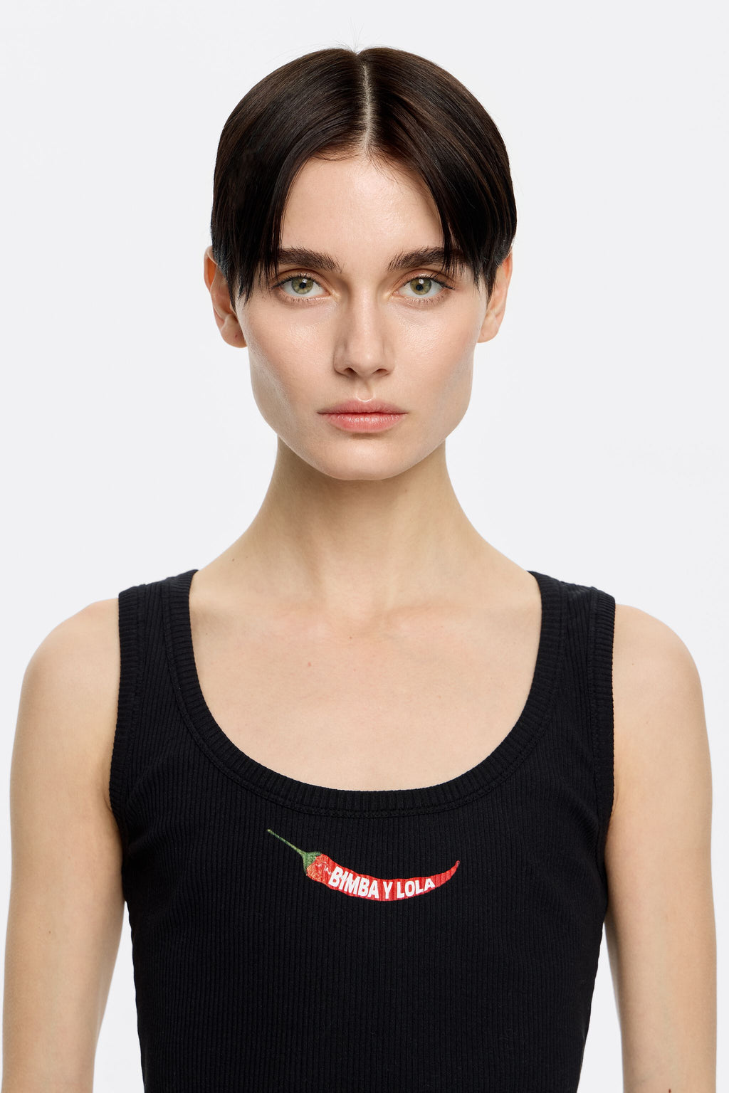 Black short top with chili pepper logo