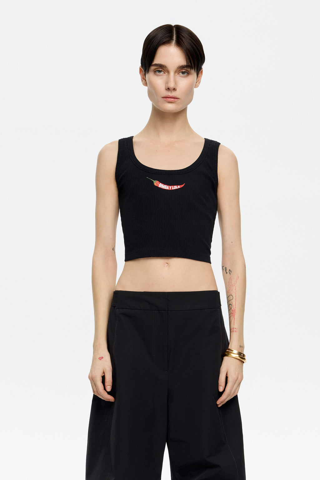 Black short top with chili pepper logo