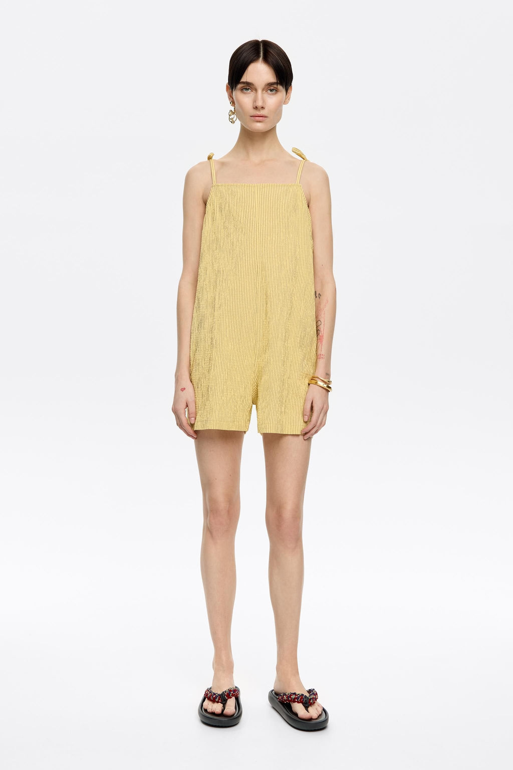 Short yellow striped jumpsuit
