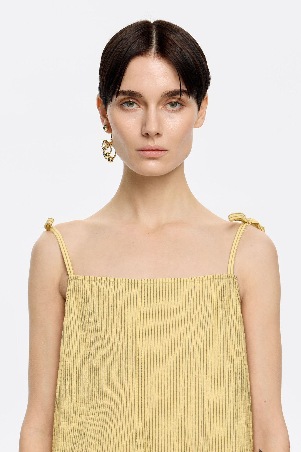 Short yellow striped jumpsuit