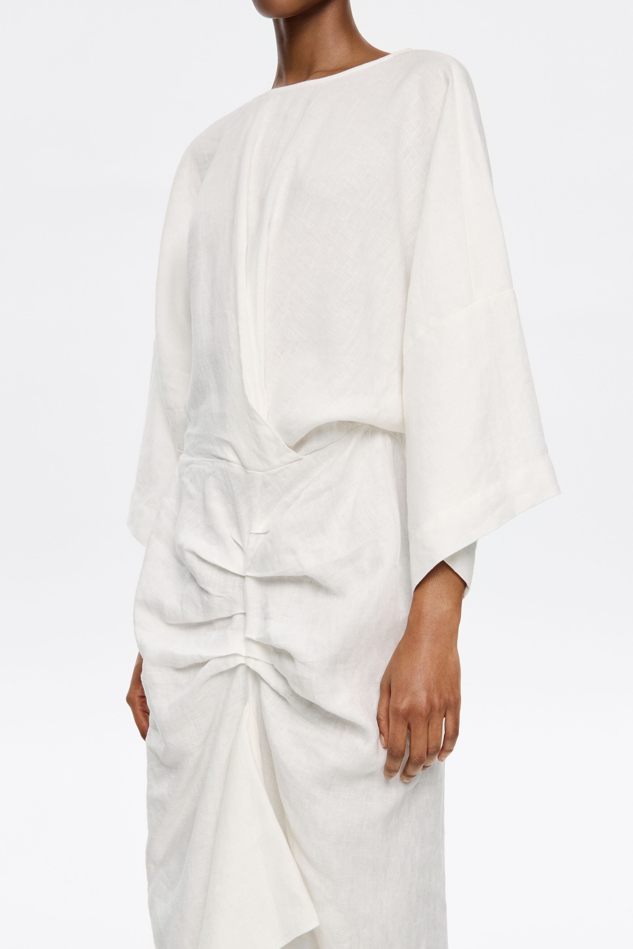 Ivory linen dress with ruffle