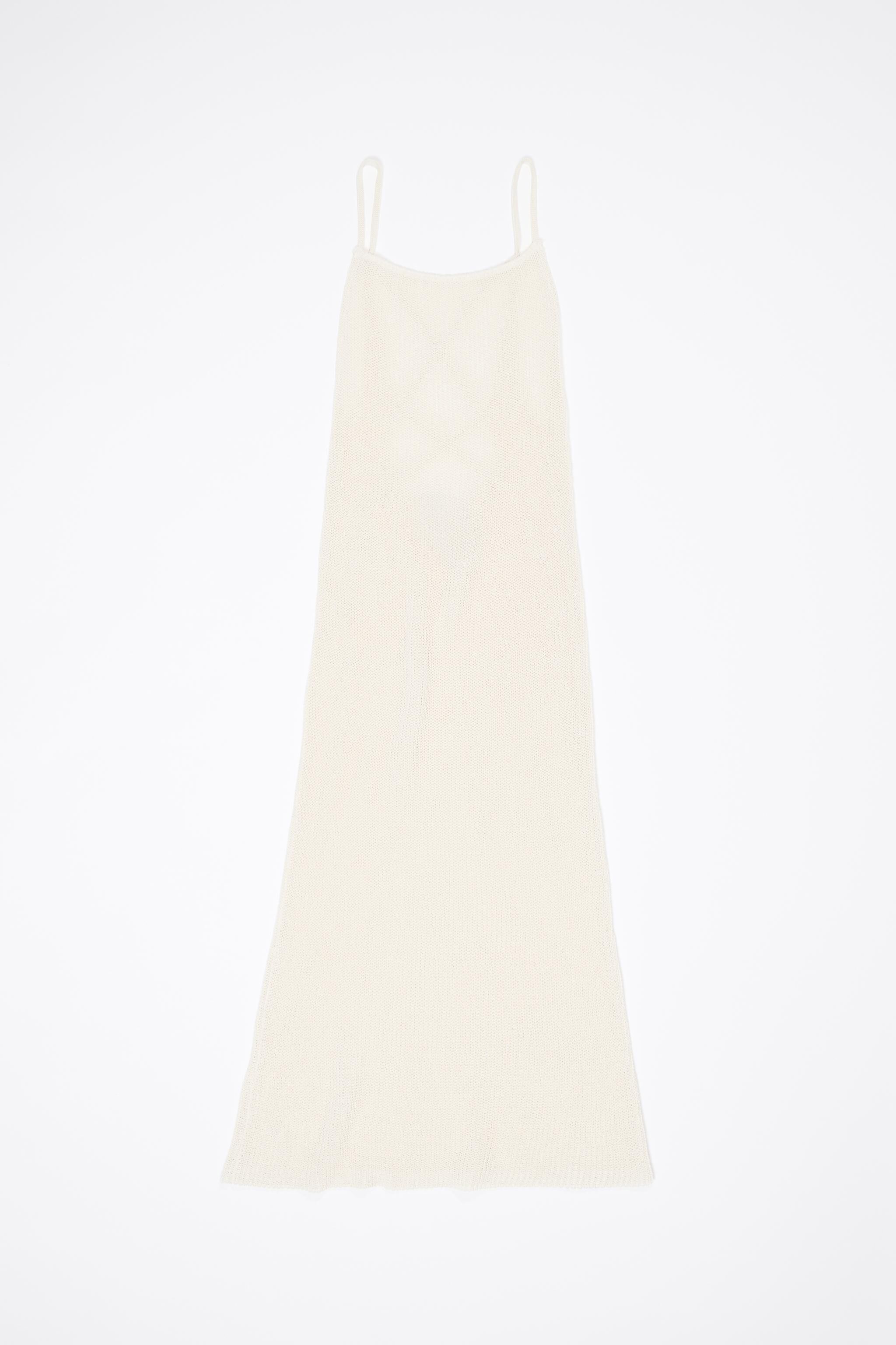 Ivory open back knit dress