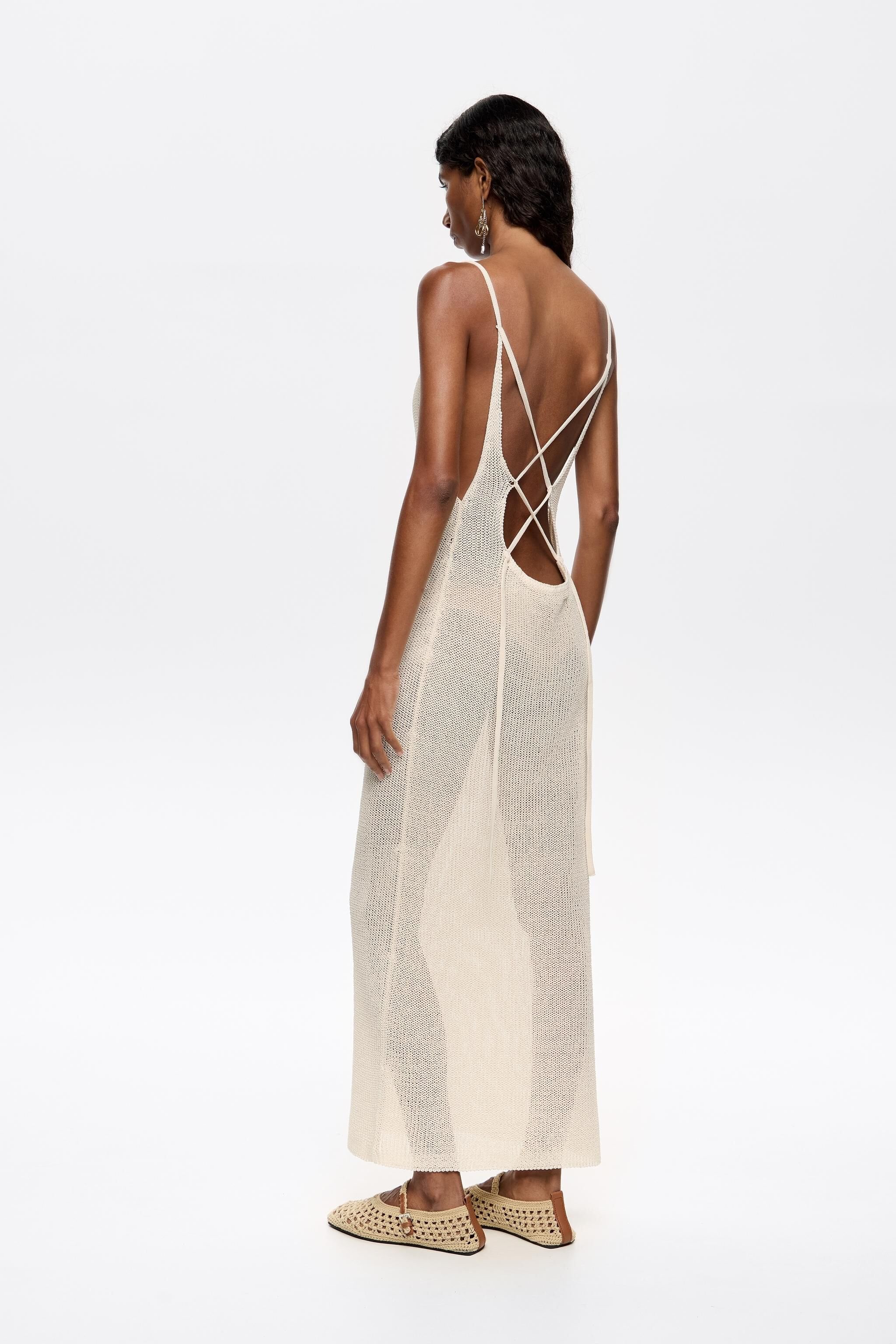 Ivory open back knit dress