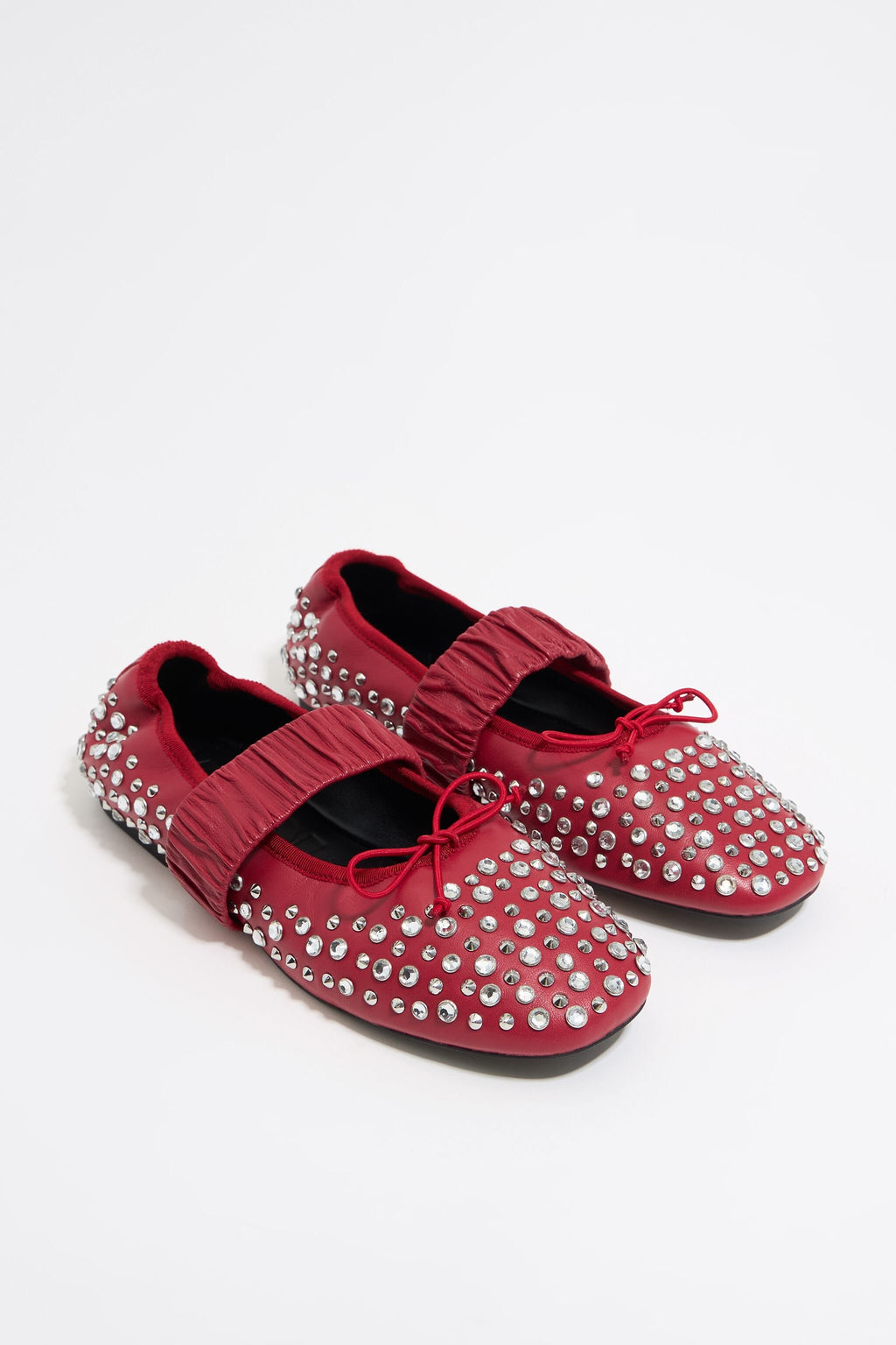 Studded red leather ballerina