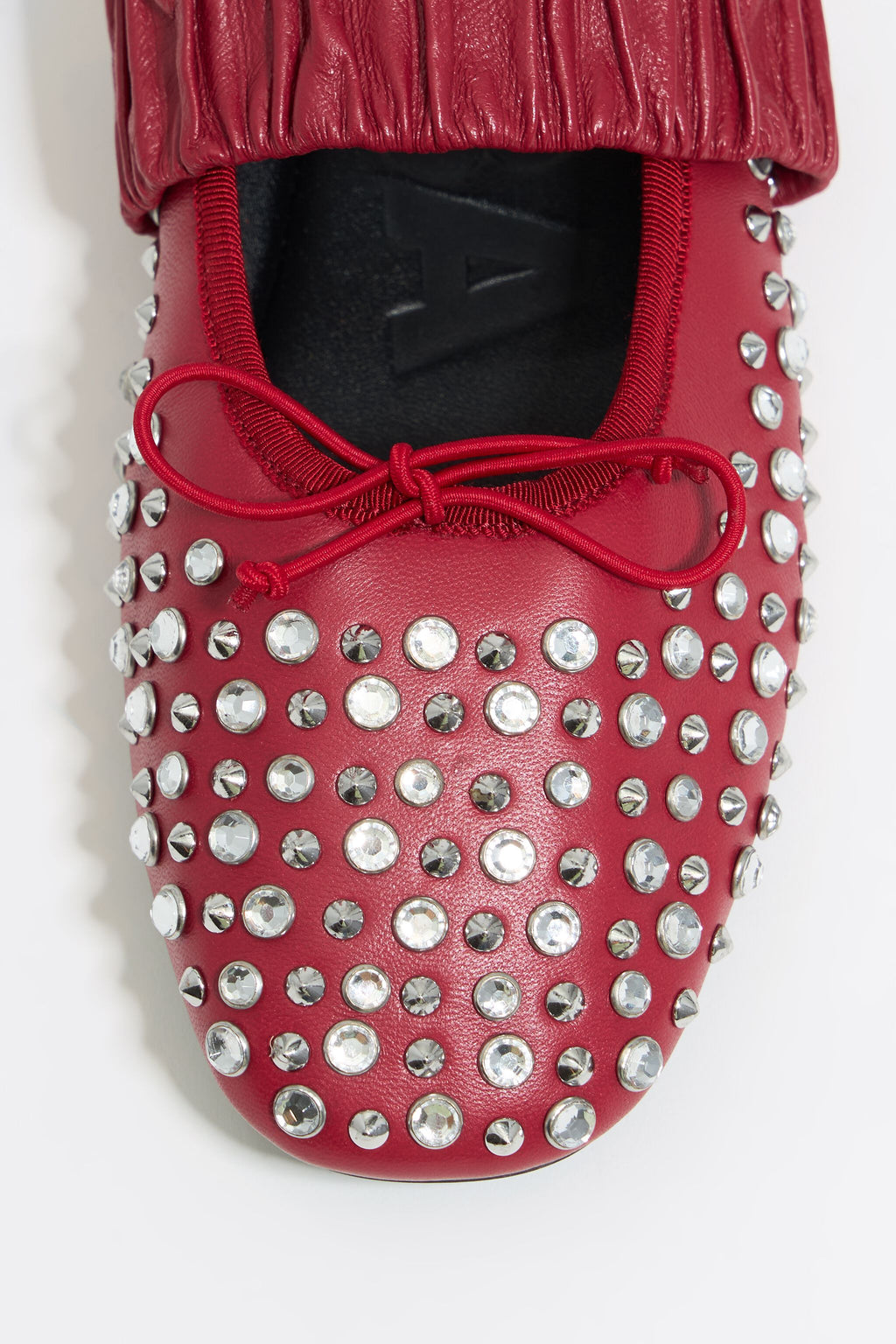 Studded red leather ballerina