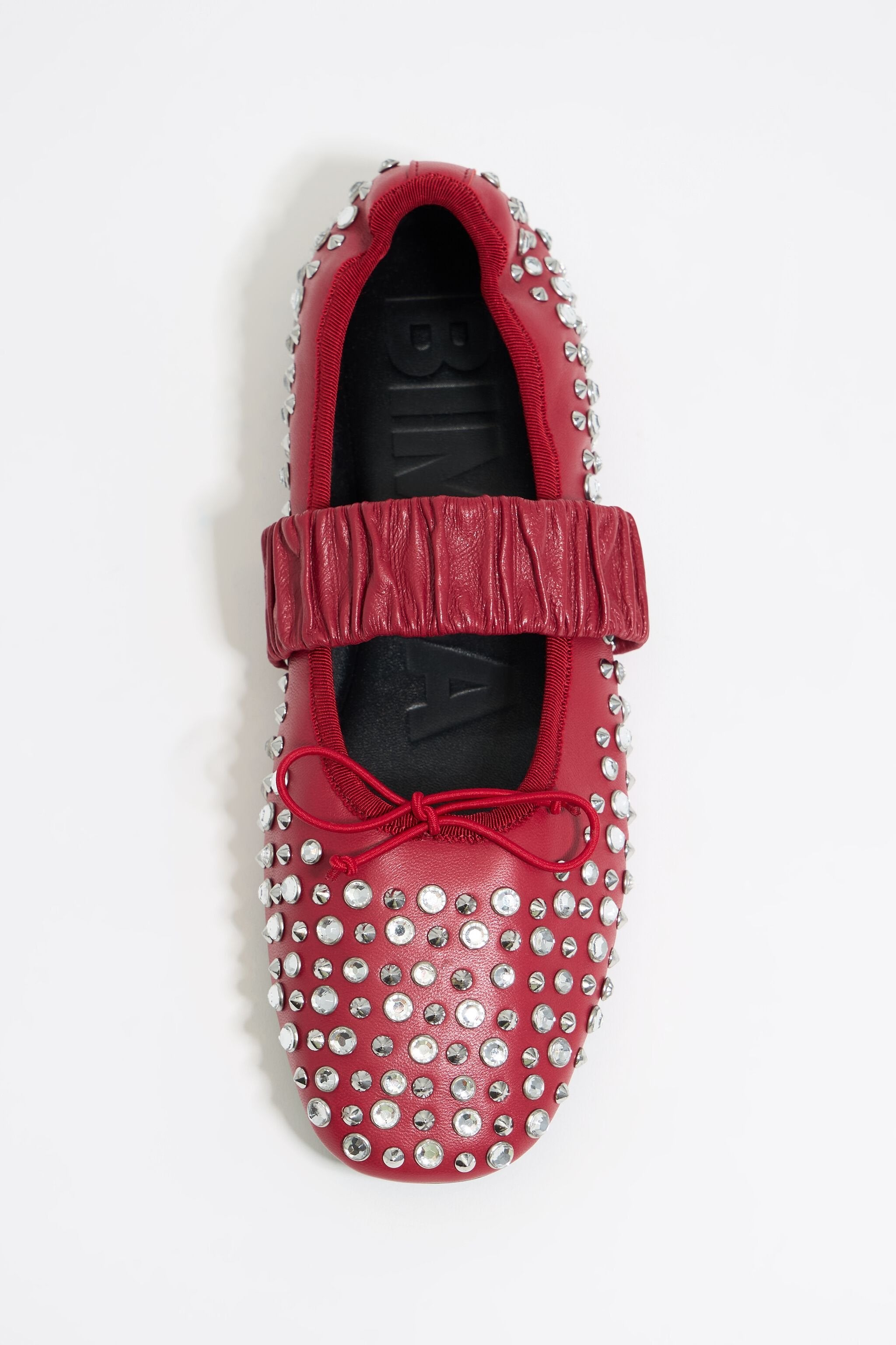 Studded red leather ballerina