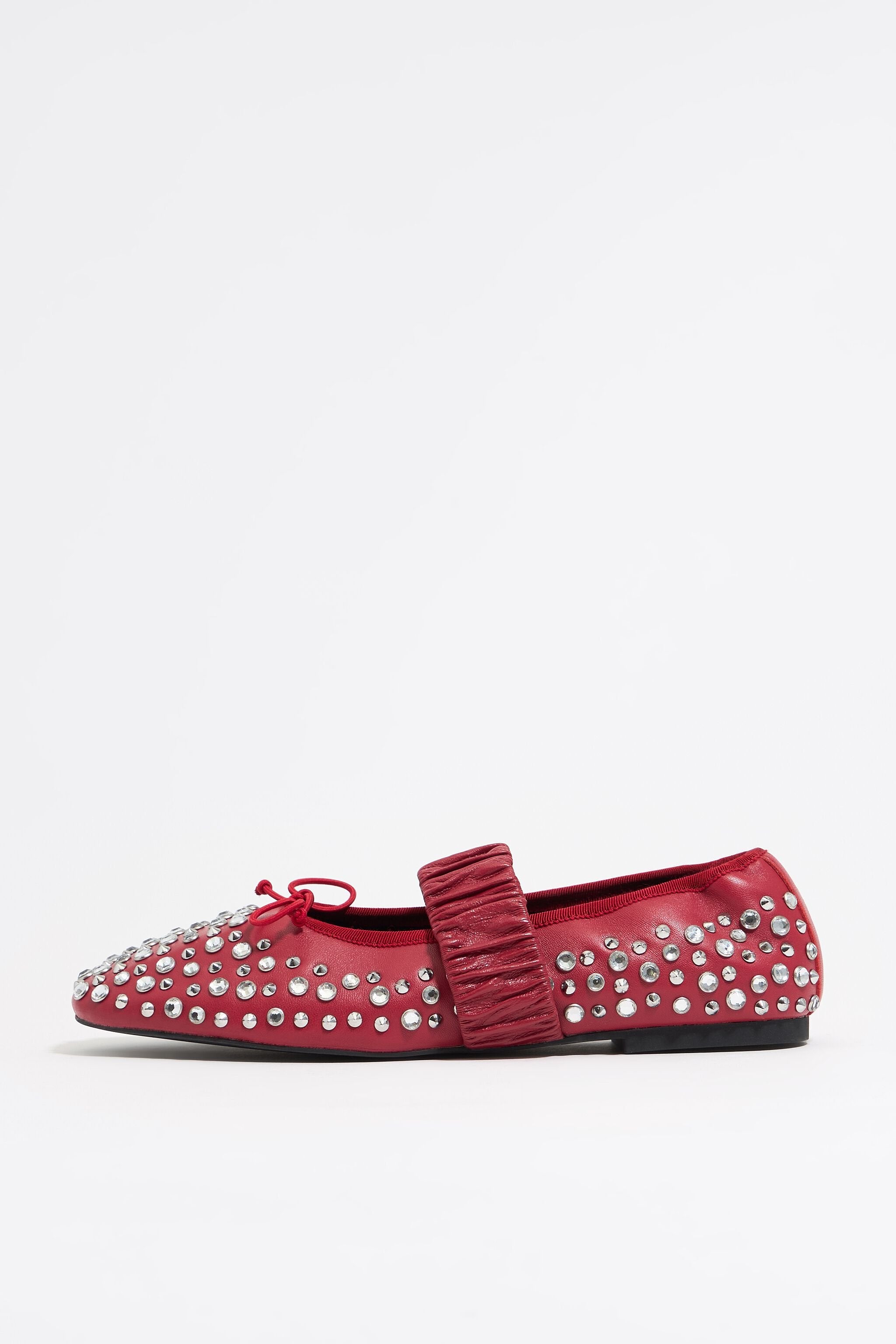 Studded red leather ballerina