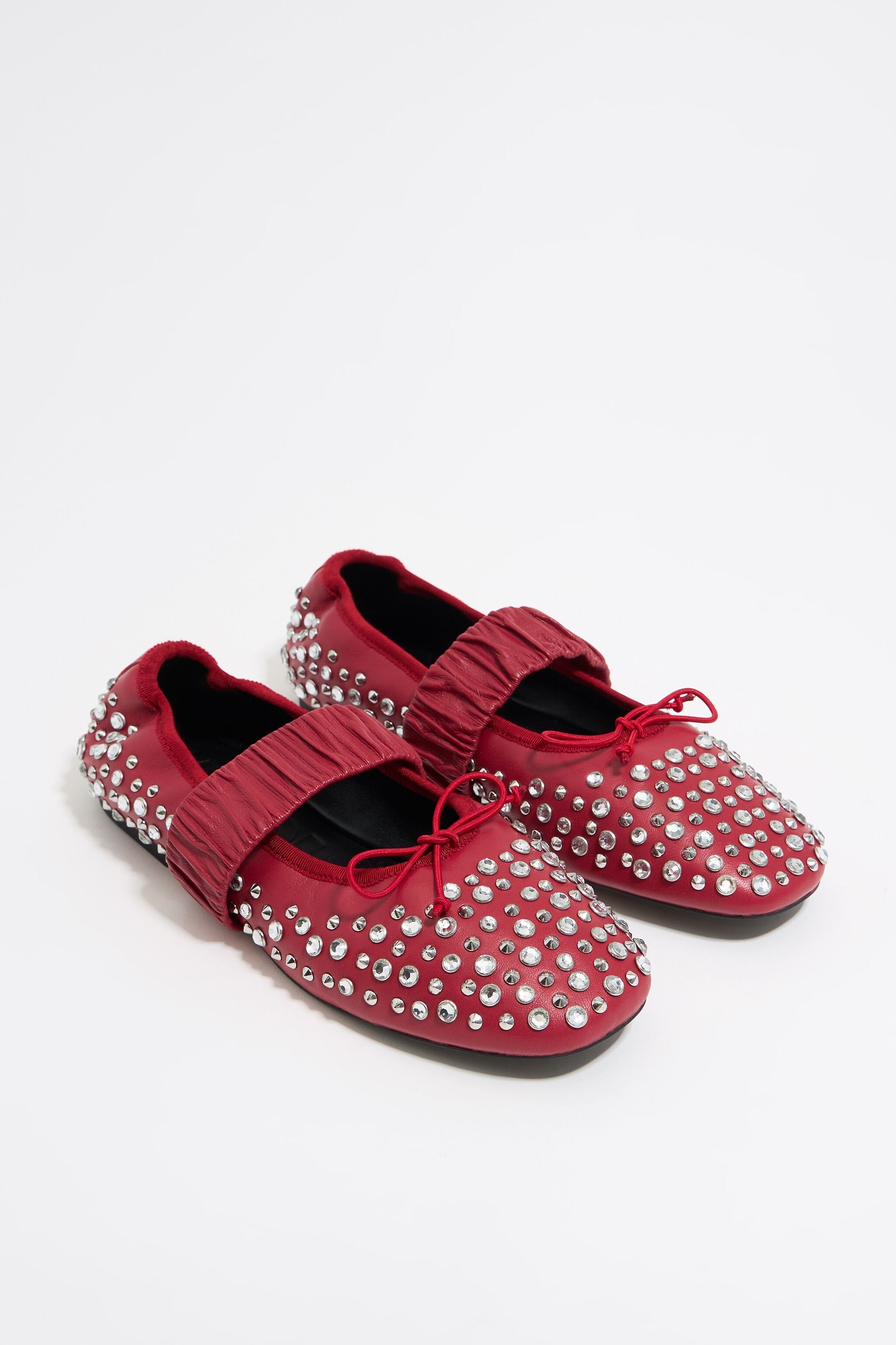 Studded red leather ballerina