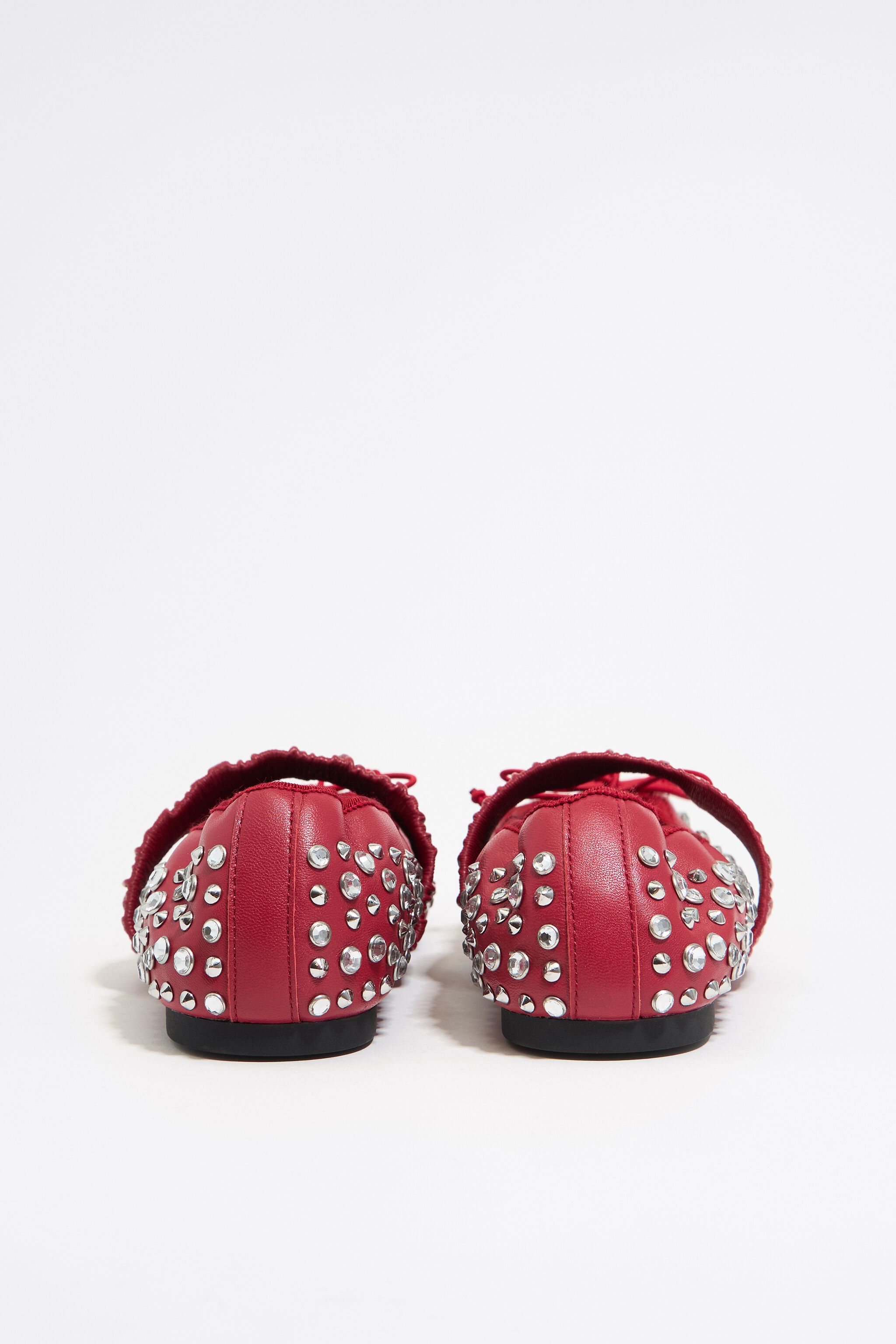 Studded red leather ballerina