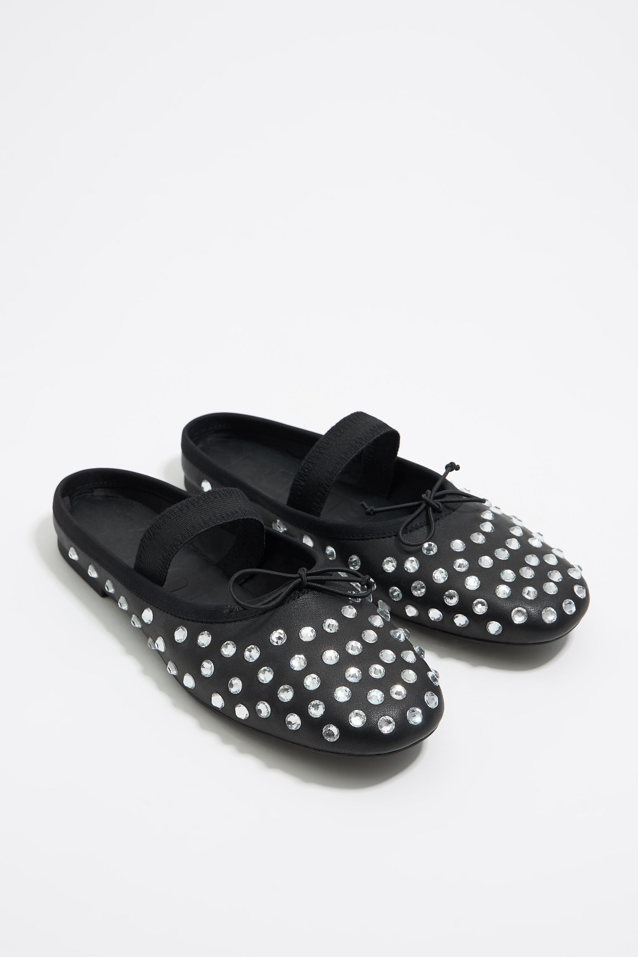 Black leather and crystals slingback ballerina