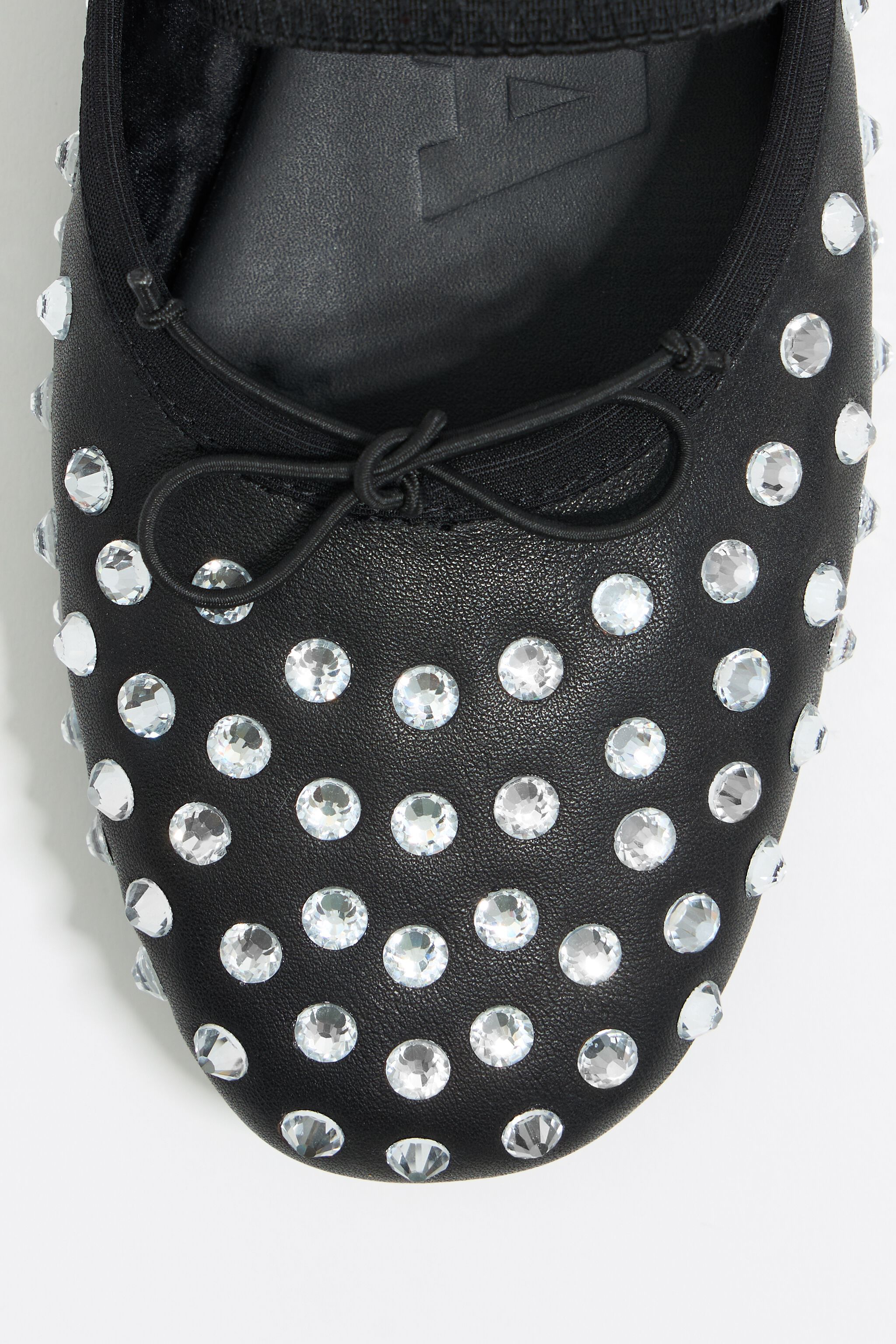 Black leather and crystals slingback ballerina
