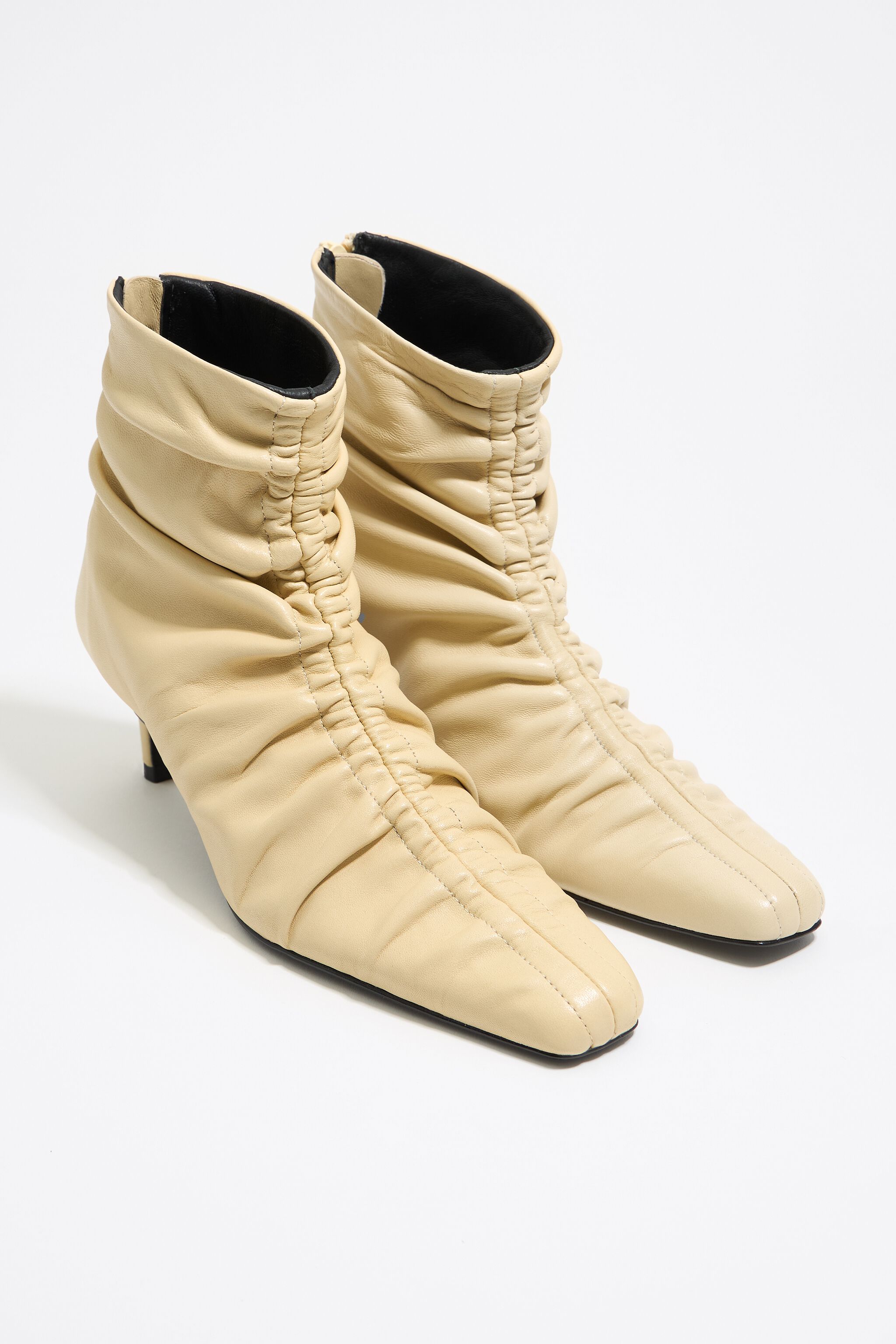 Butter yellow leather ruched heeled ankle boot