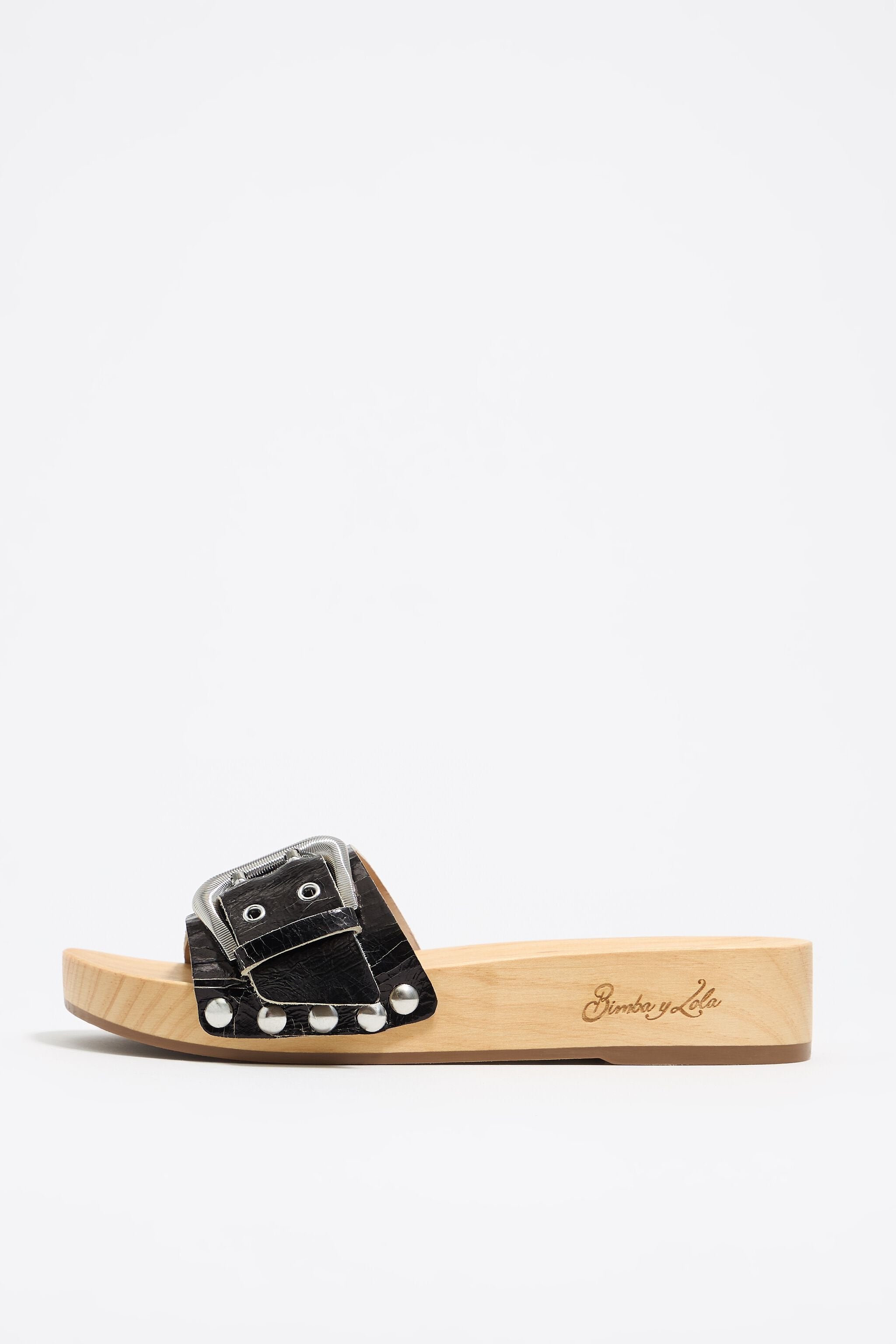 Black leather sandal with wooden sole