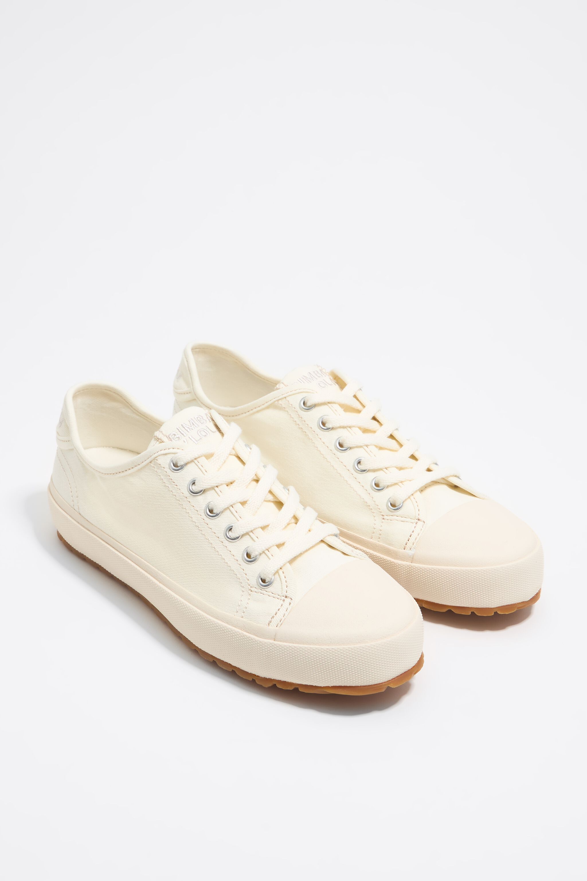 White canvas vulcanized sneaker