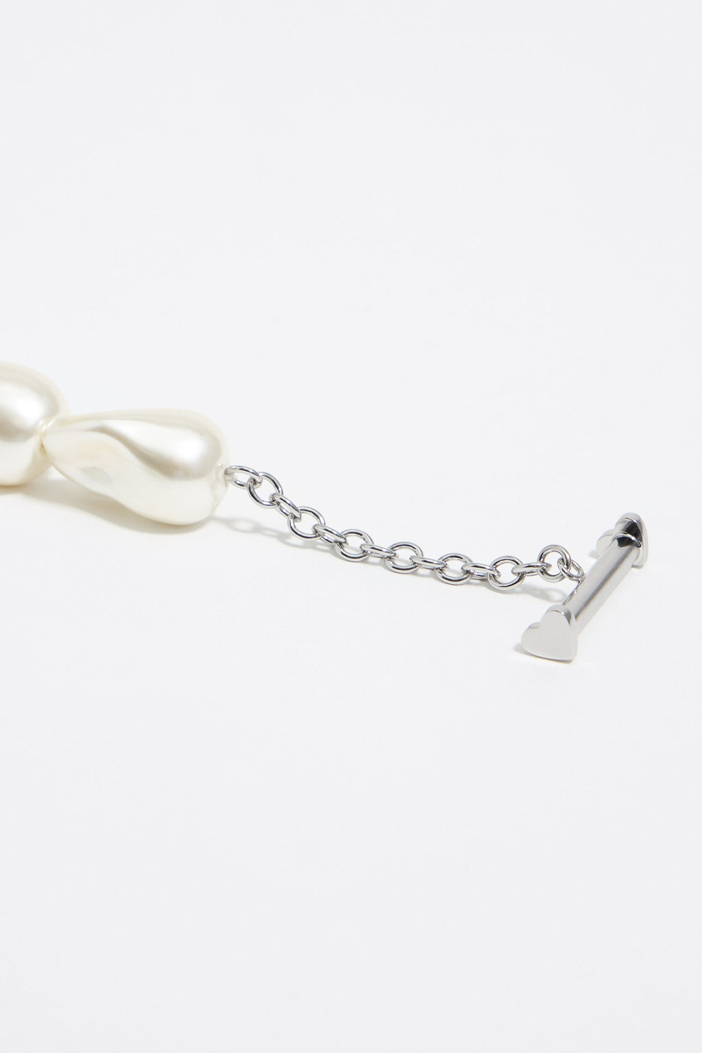 silver-tone chain and pearl heart logo bracelet