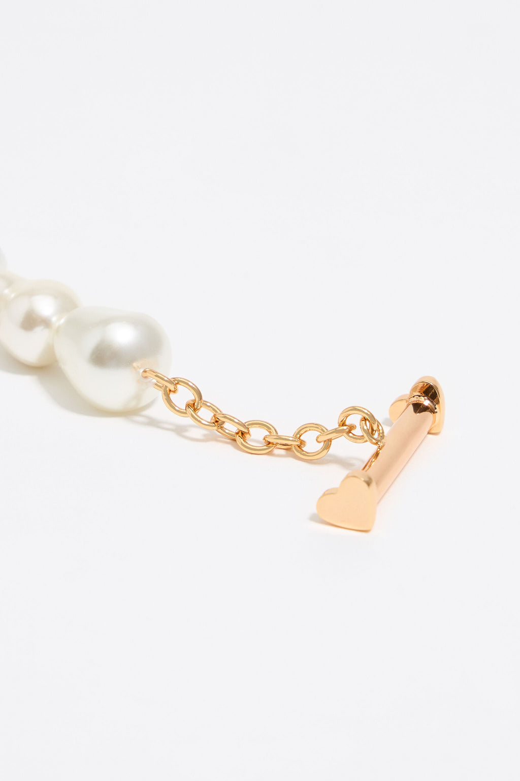 Gold-tone chain and pearl heart logos bracelet