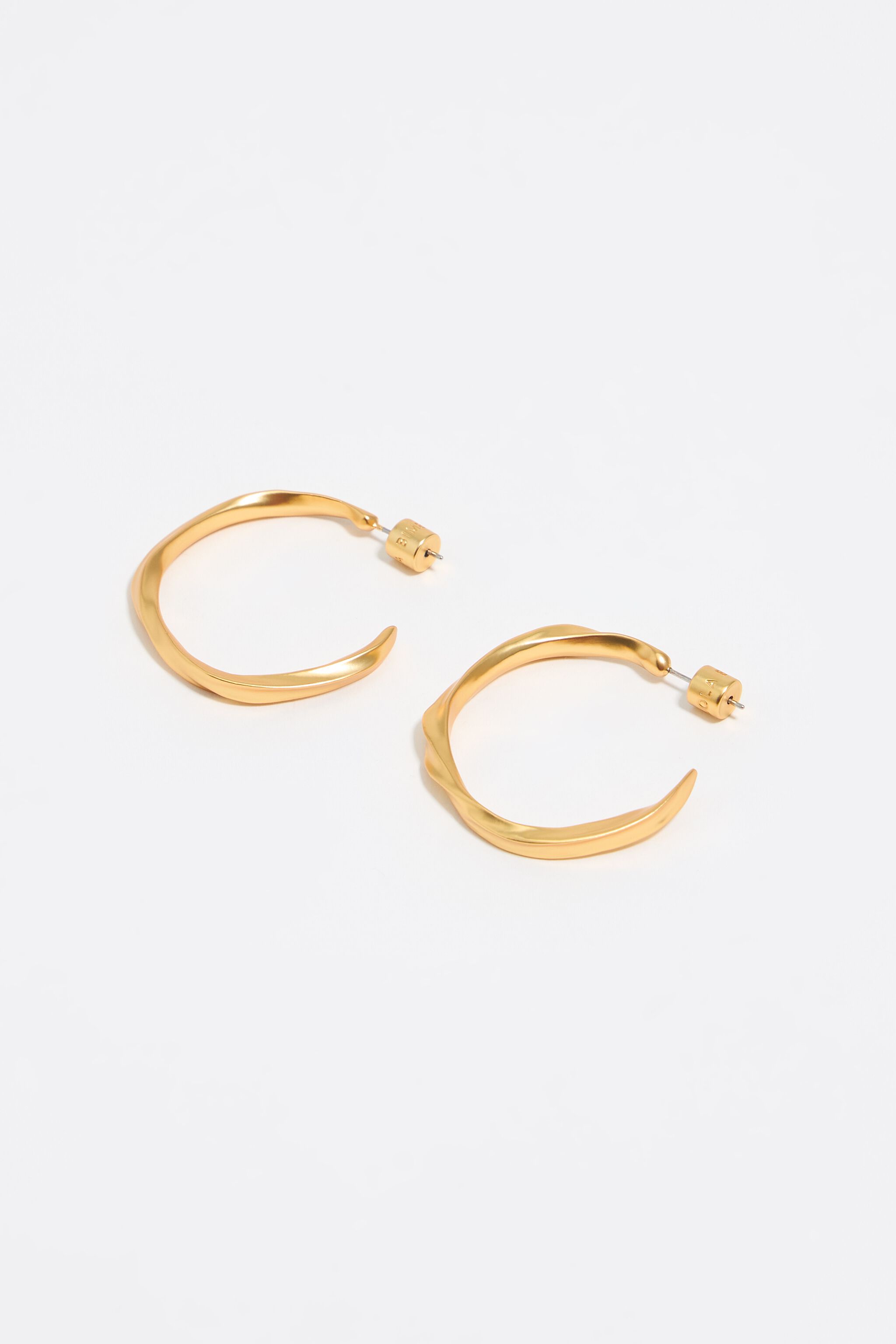 Maxi matte gold uneven hoop earrings