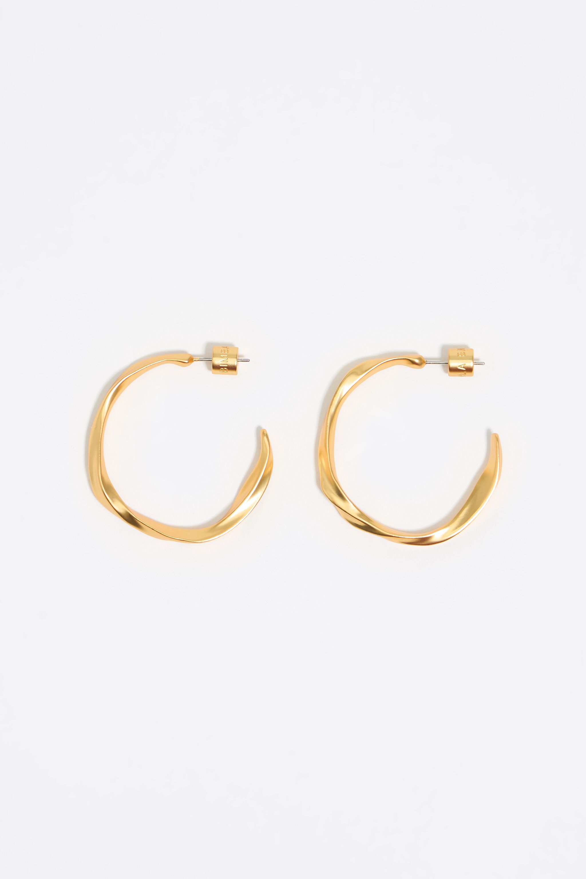 Maxi matte gold uneven hoop earrings