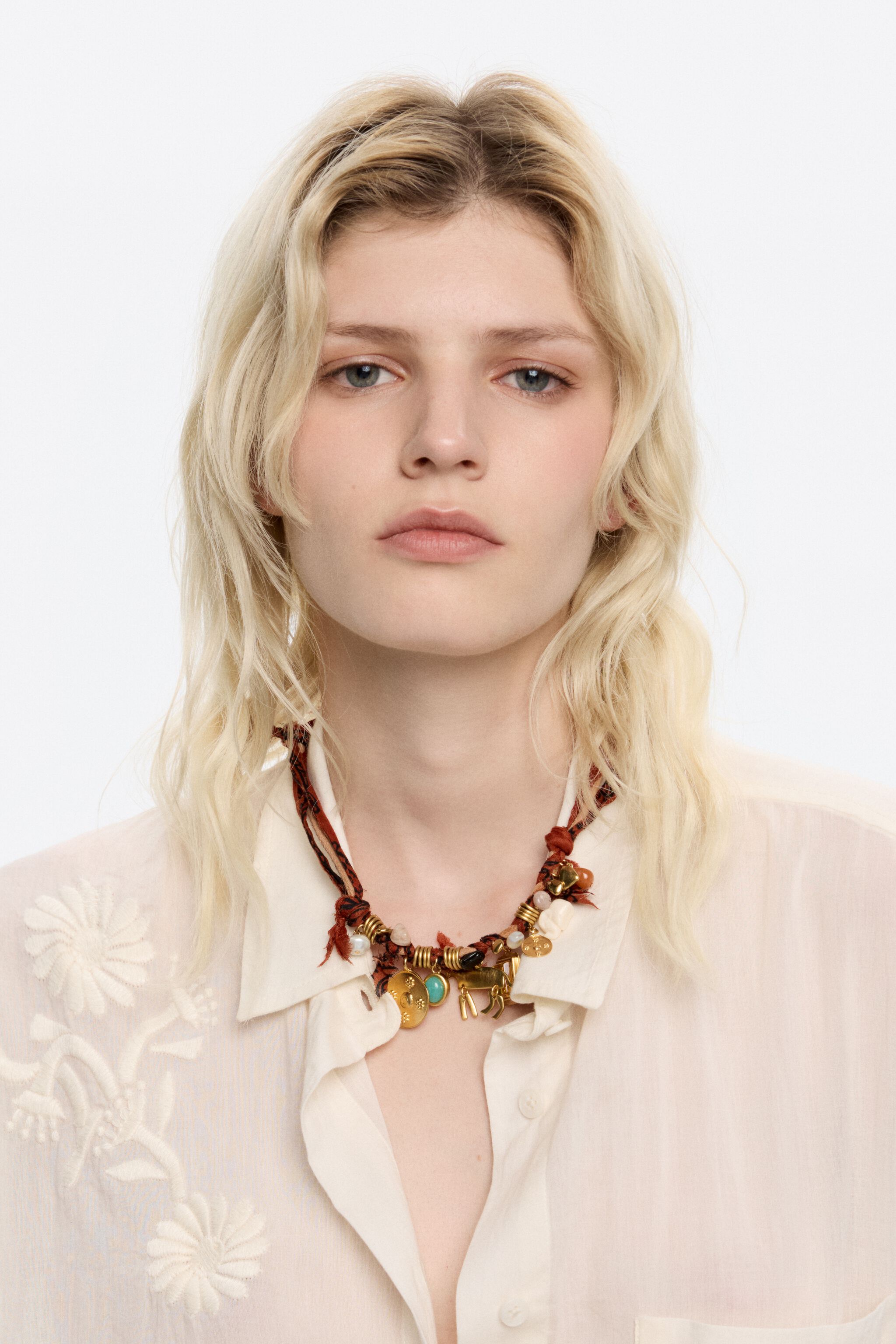 Plaited fabric necklace with gold-tone metal motifs