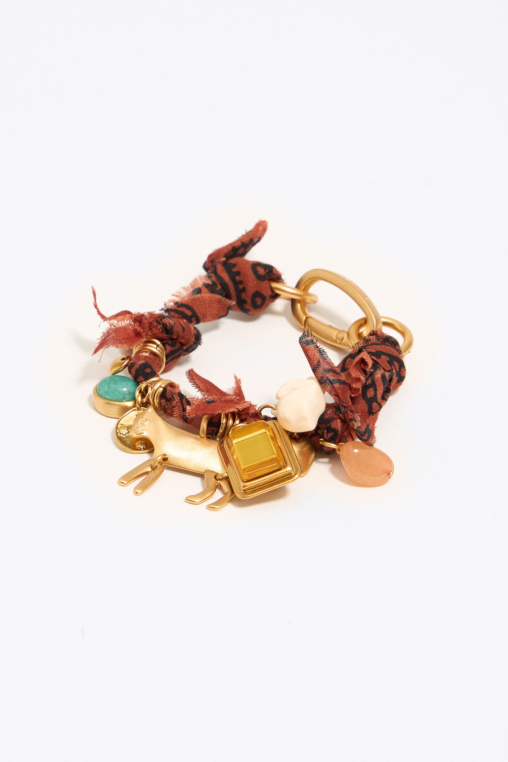 Plaited fabric bracelet with gold-tone metal pieces