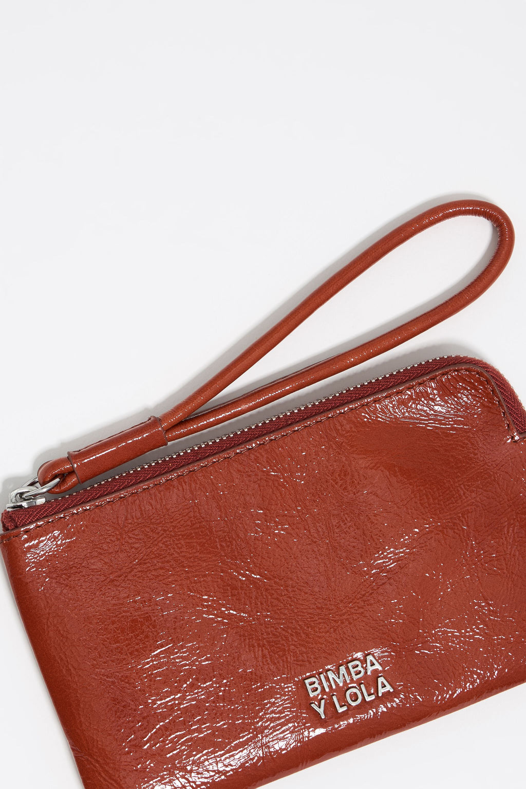 Small burnt orange leather coin purse