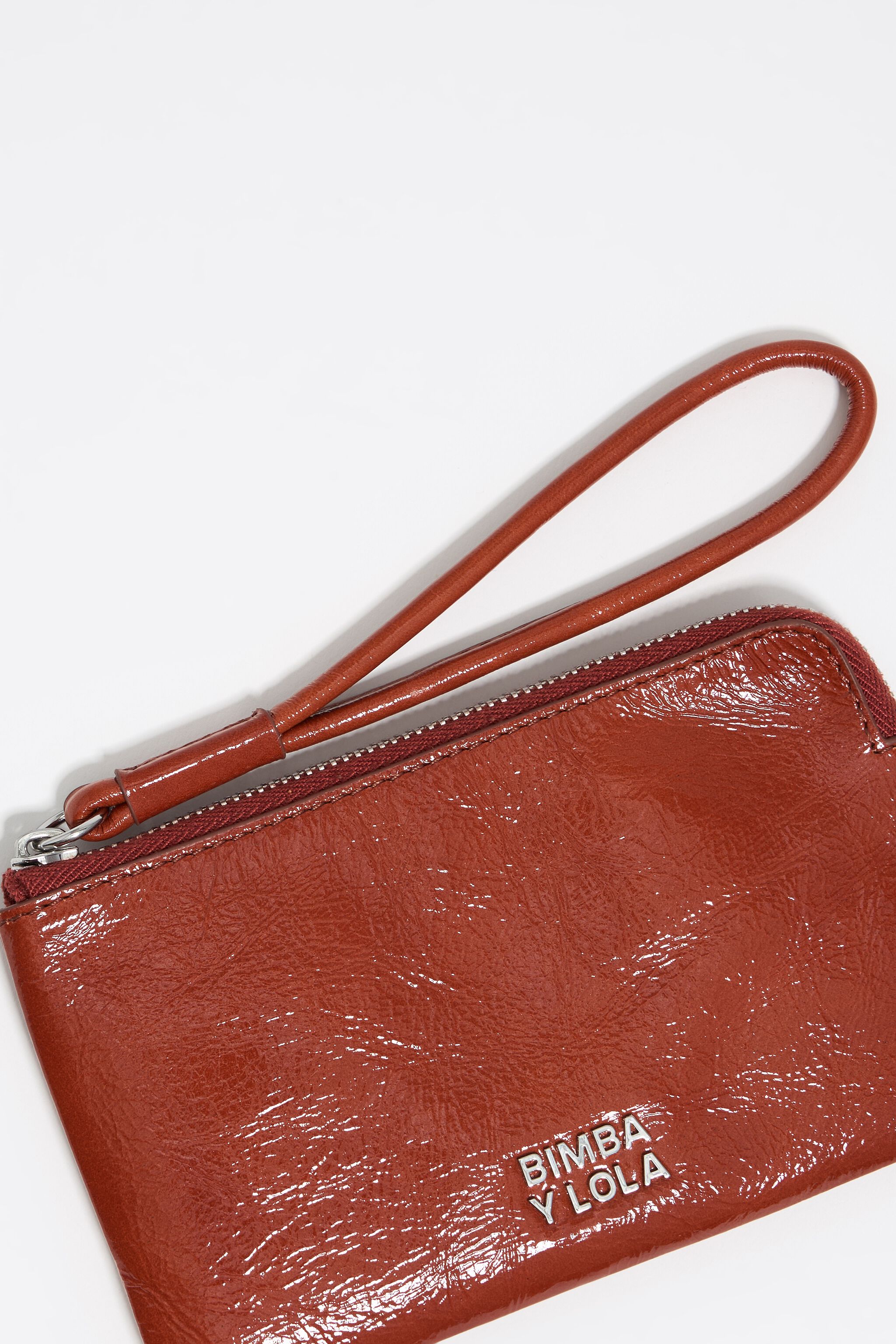 Small burnt orange leather coin purse