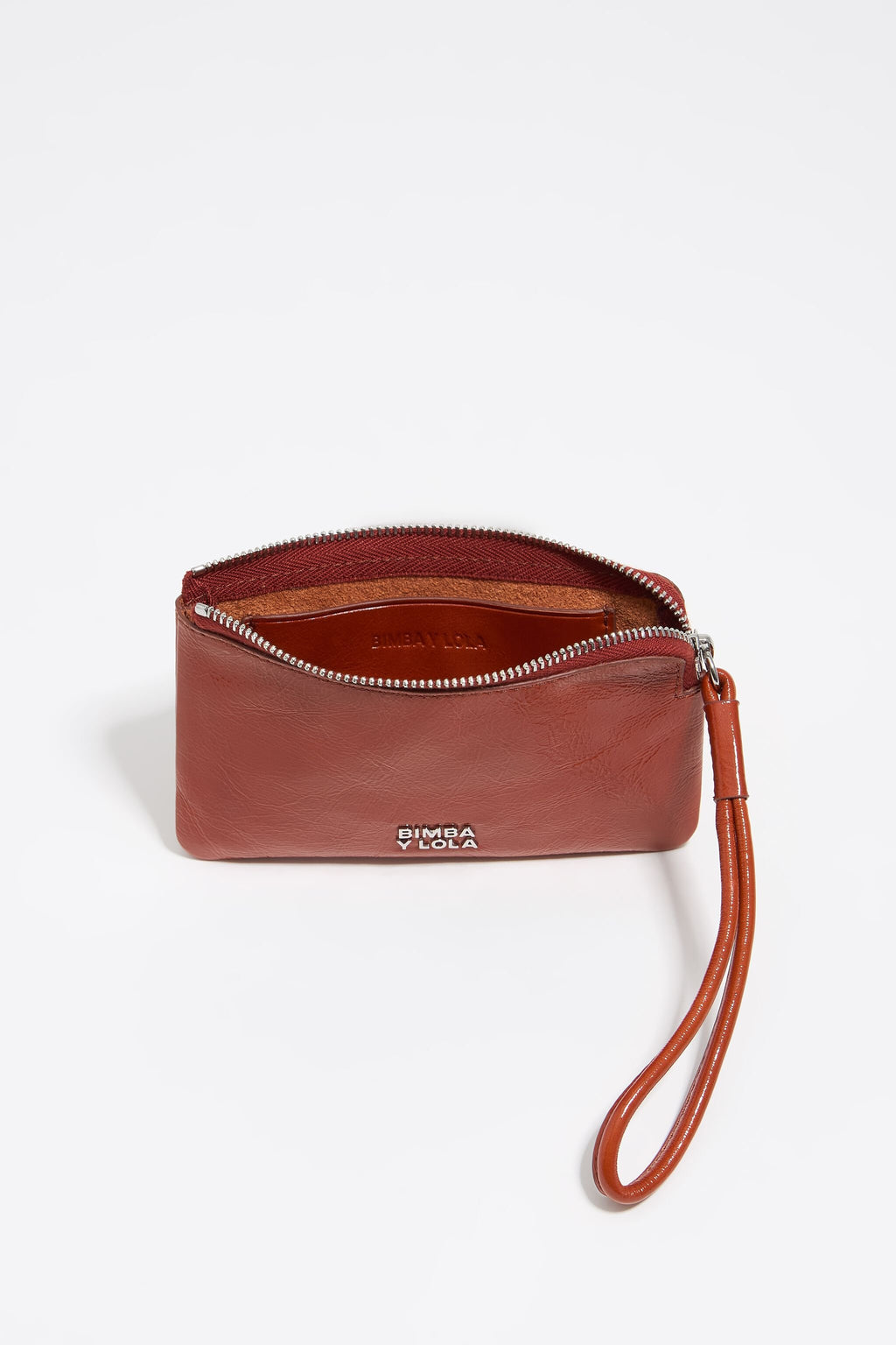 Small burnt orange leather coin purse