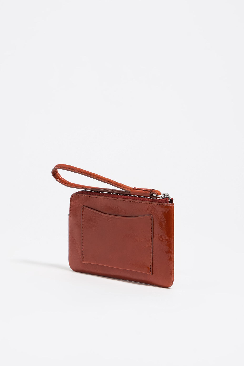 Small burnt orange leather coin purse