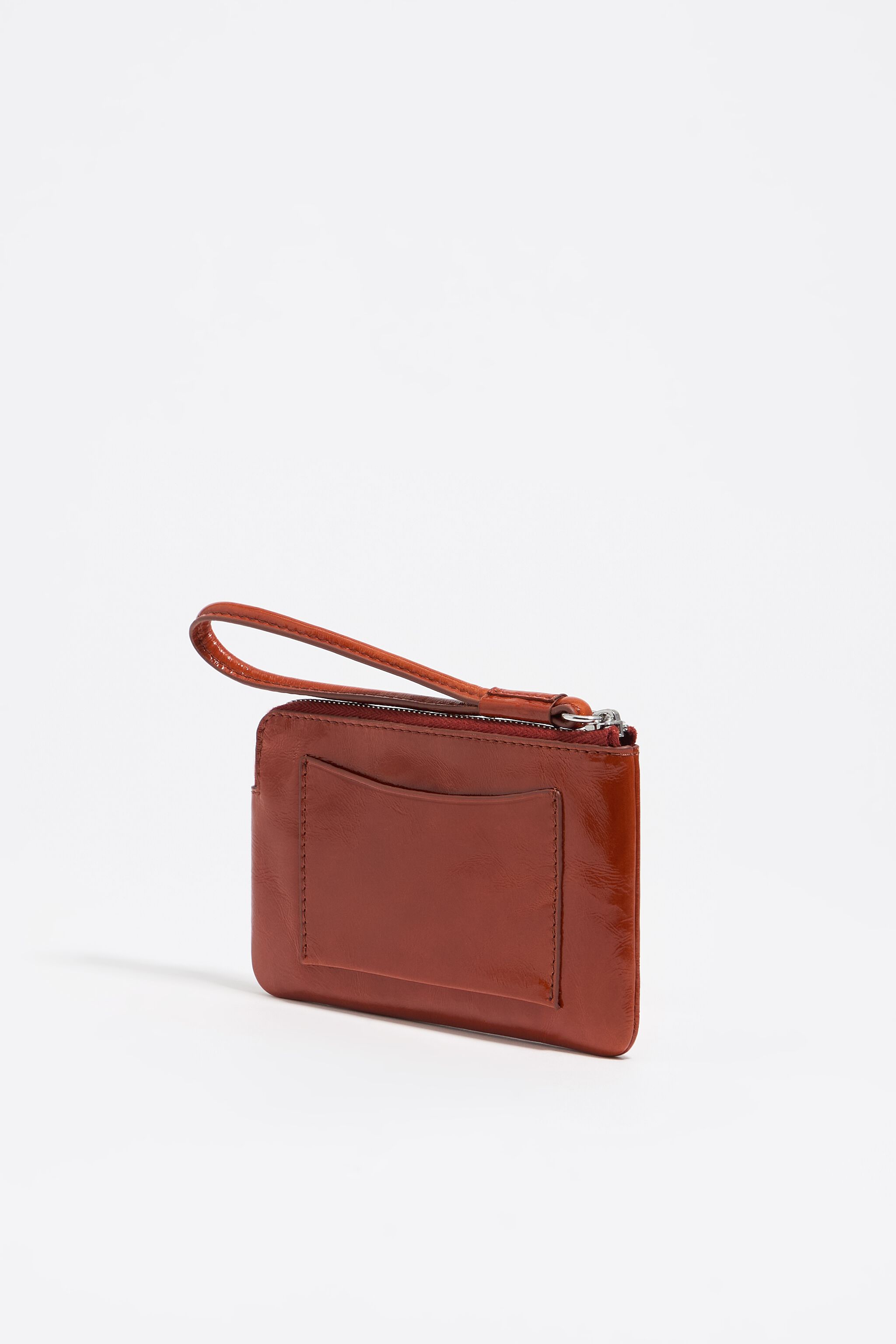 Small burnt orange leather coin purse