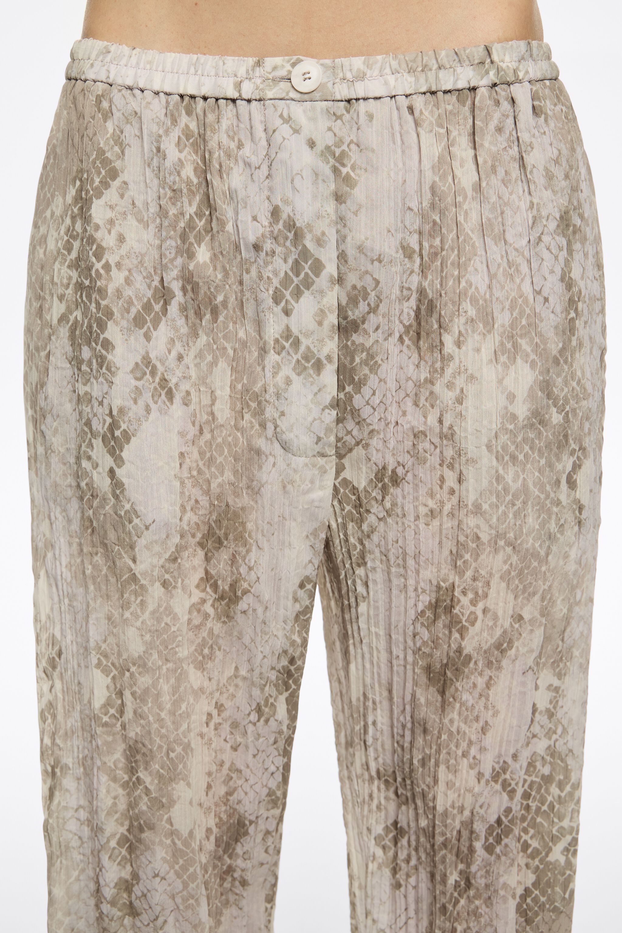 Taupe Snake pleated jogger trousers