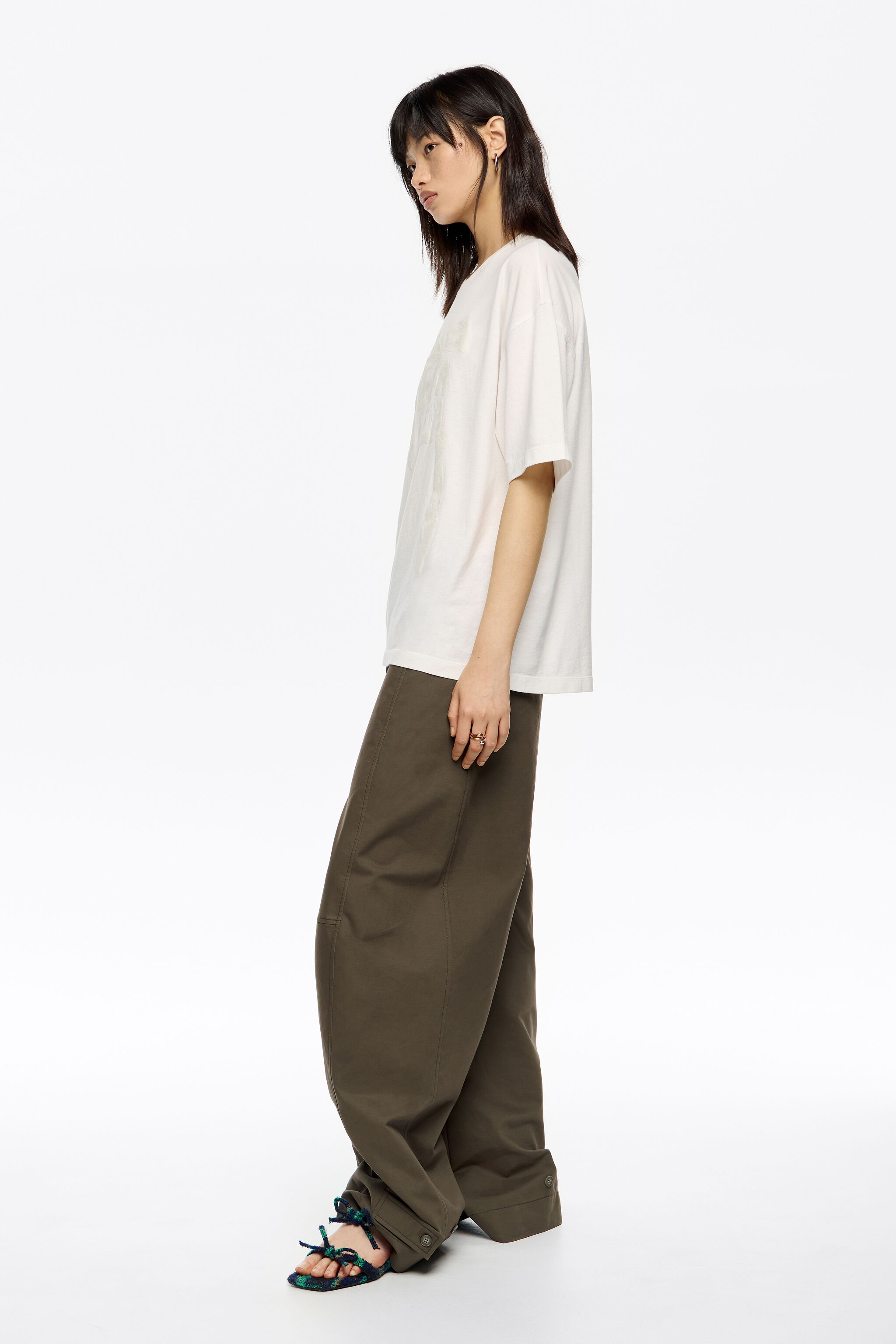 Dark khaki adjustable barrel leg trousers