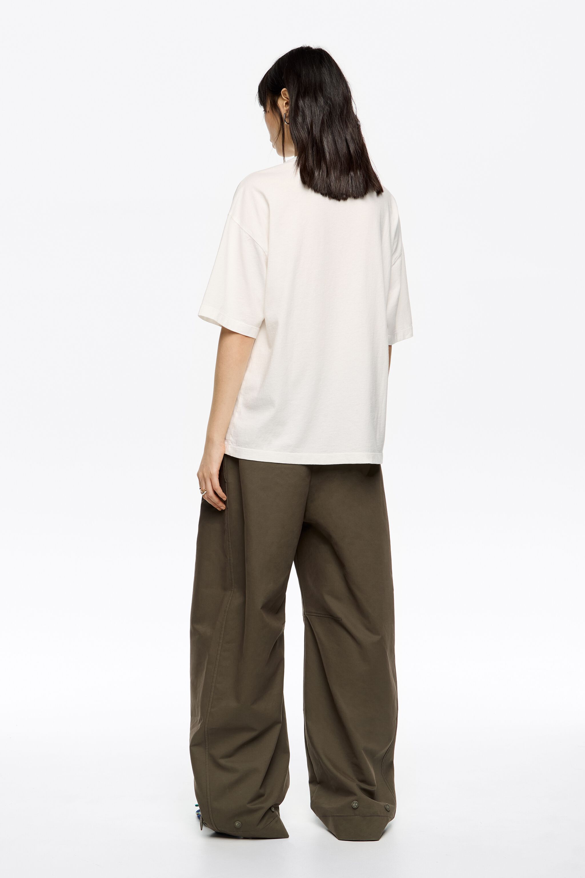 Dark khaki adjustable barrel leg trousers