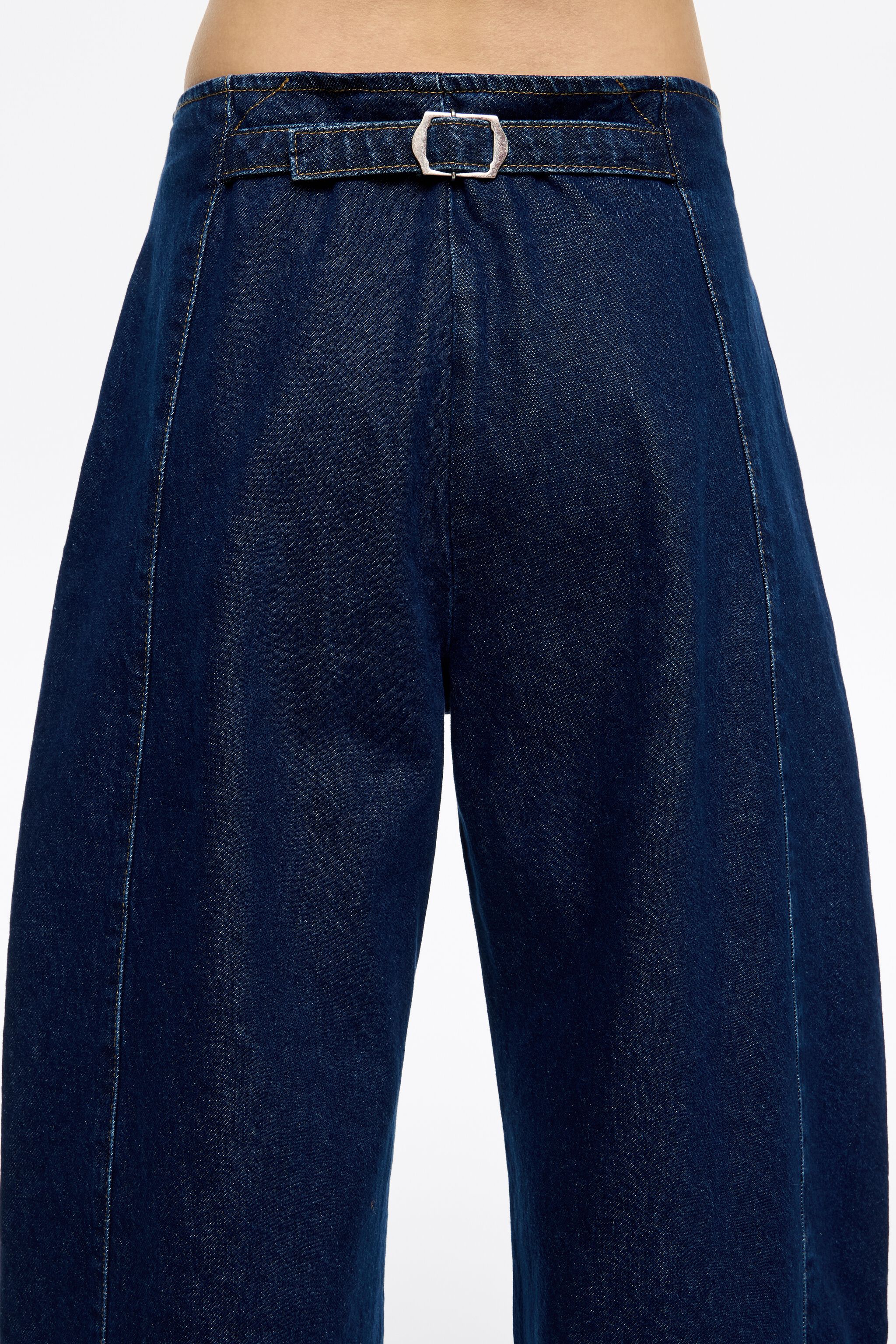 Dark blue buckled denim jeans