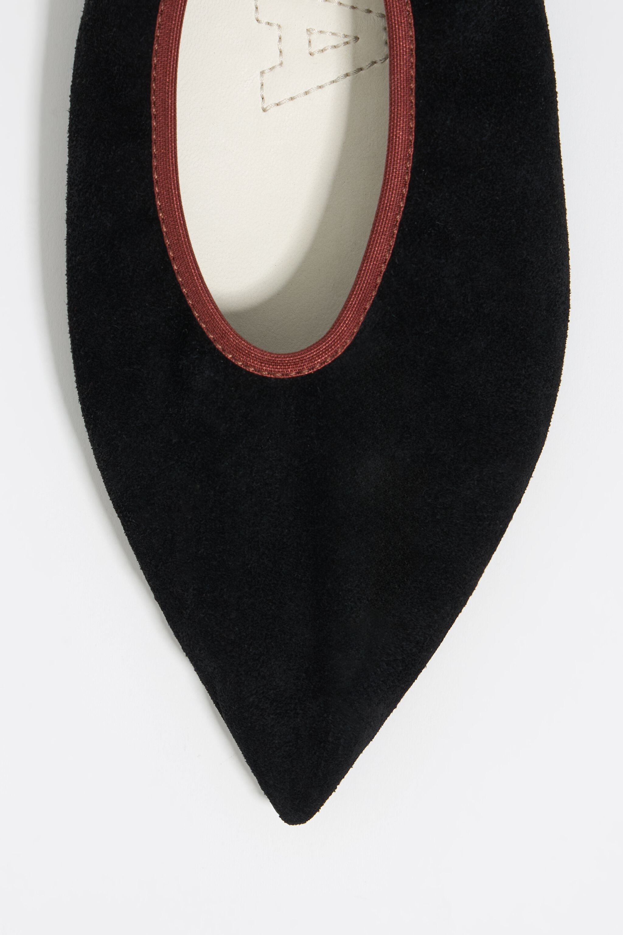 Black suede pointed toe ballerina